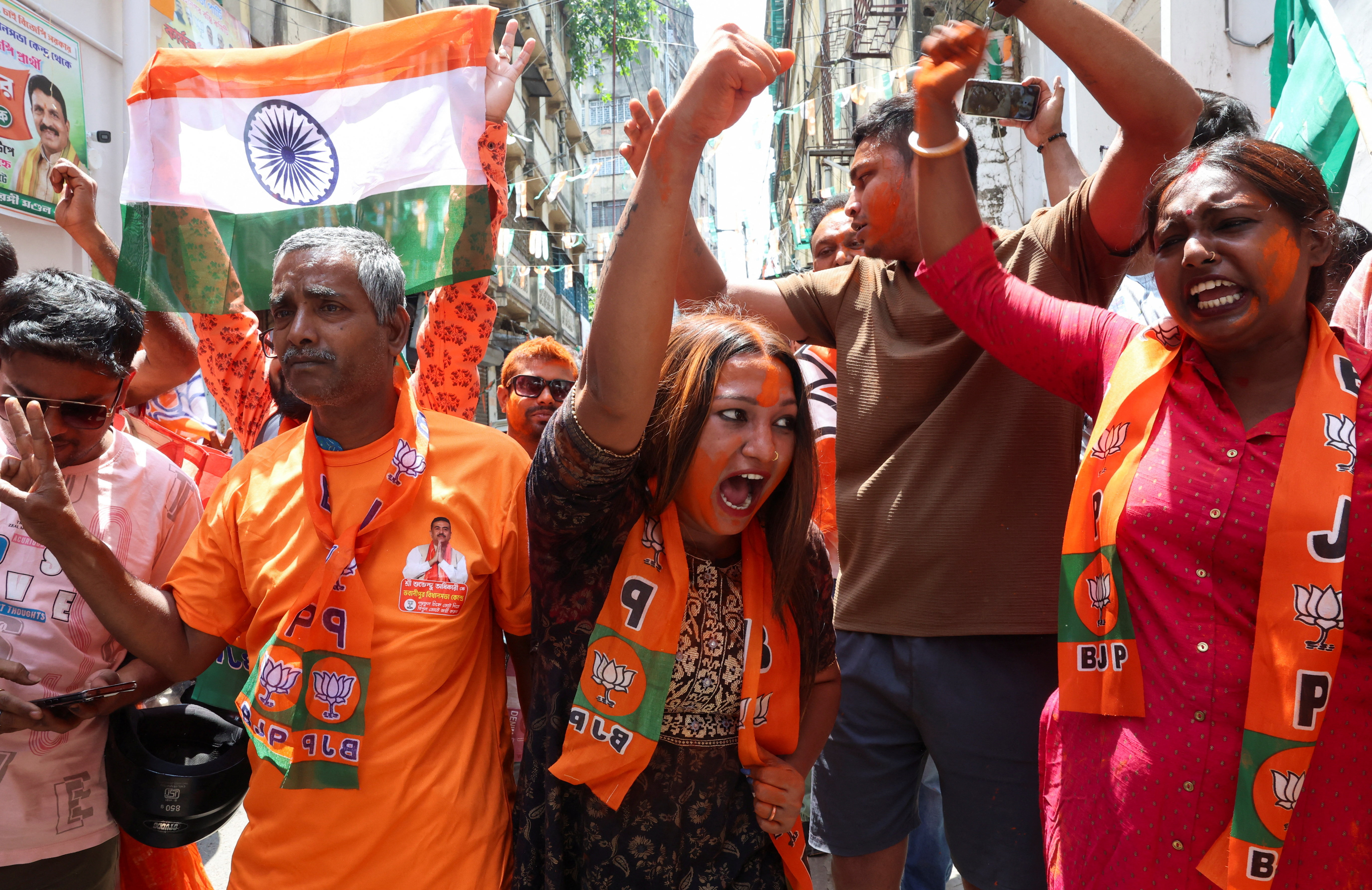 India's governing Bharatiya Janata Party (BJP) supporters celebrate the win in the elections.