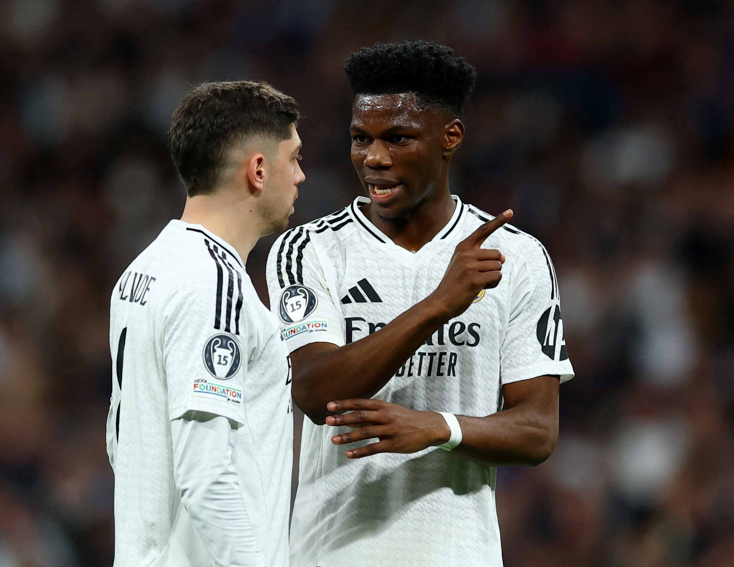 Real Madrid's Federico Valverde and Aurelien Tchouameni