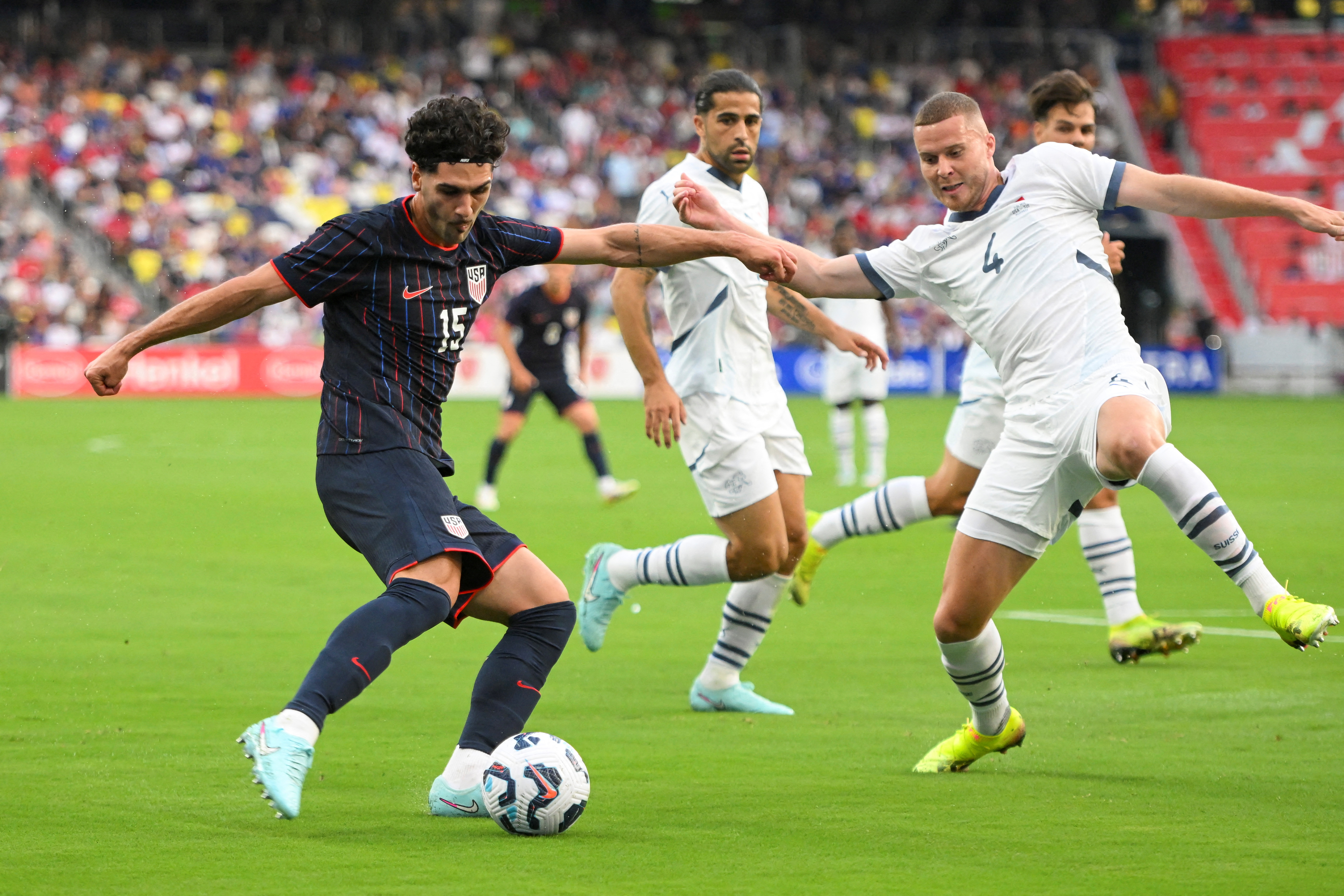 FILE PHOTO: Jun 10, 2025; Nashville, Tennessee, USA; United States midfielder Johnny Cardoso (15) has a shot blocked by Switzerland defender Nico Elvedi (4) at Geodis Park. Mandatory Credit: Steve Roberts-Imagn Images/File Photo