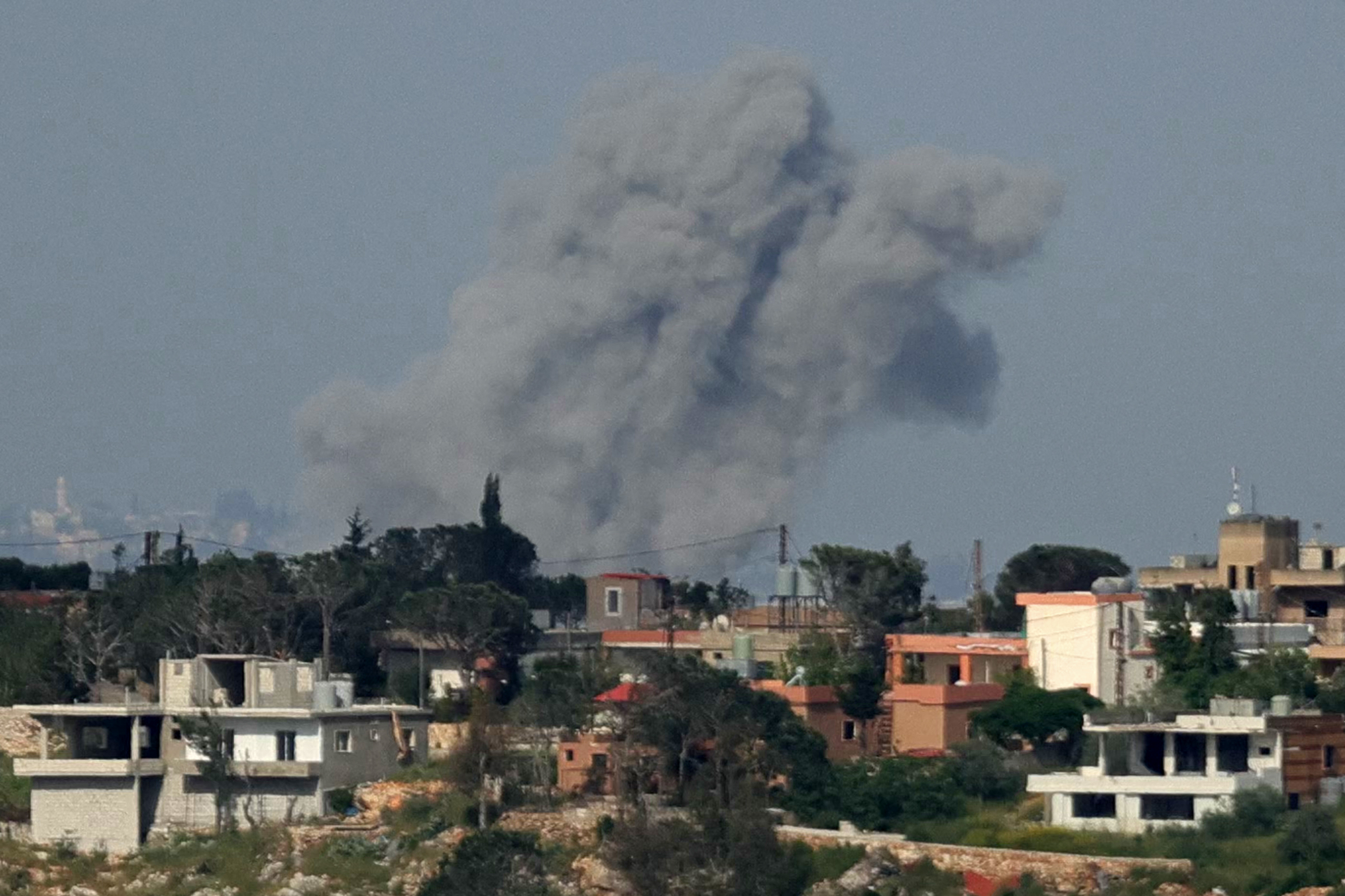 This photograph taken from the southern Lebanese area of Marjayoun shows smoke rising from the site of Israeli airstrikes that targeted the village of Zawtar al-Sharqiyah,
