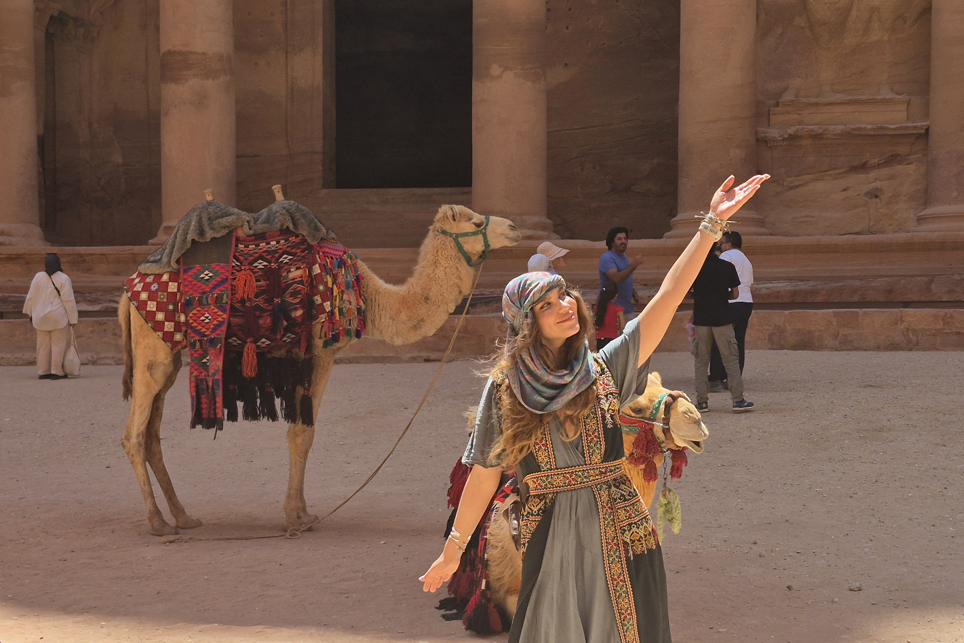 Tourists visit the Treasury in the ruins of the ancient Nabatean city of Petra