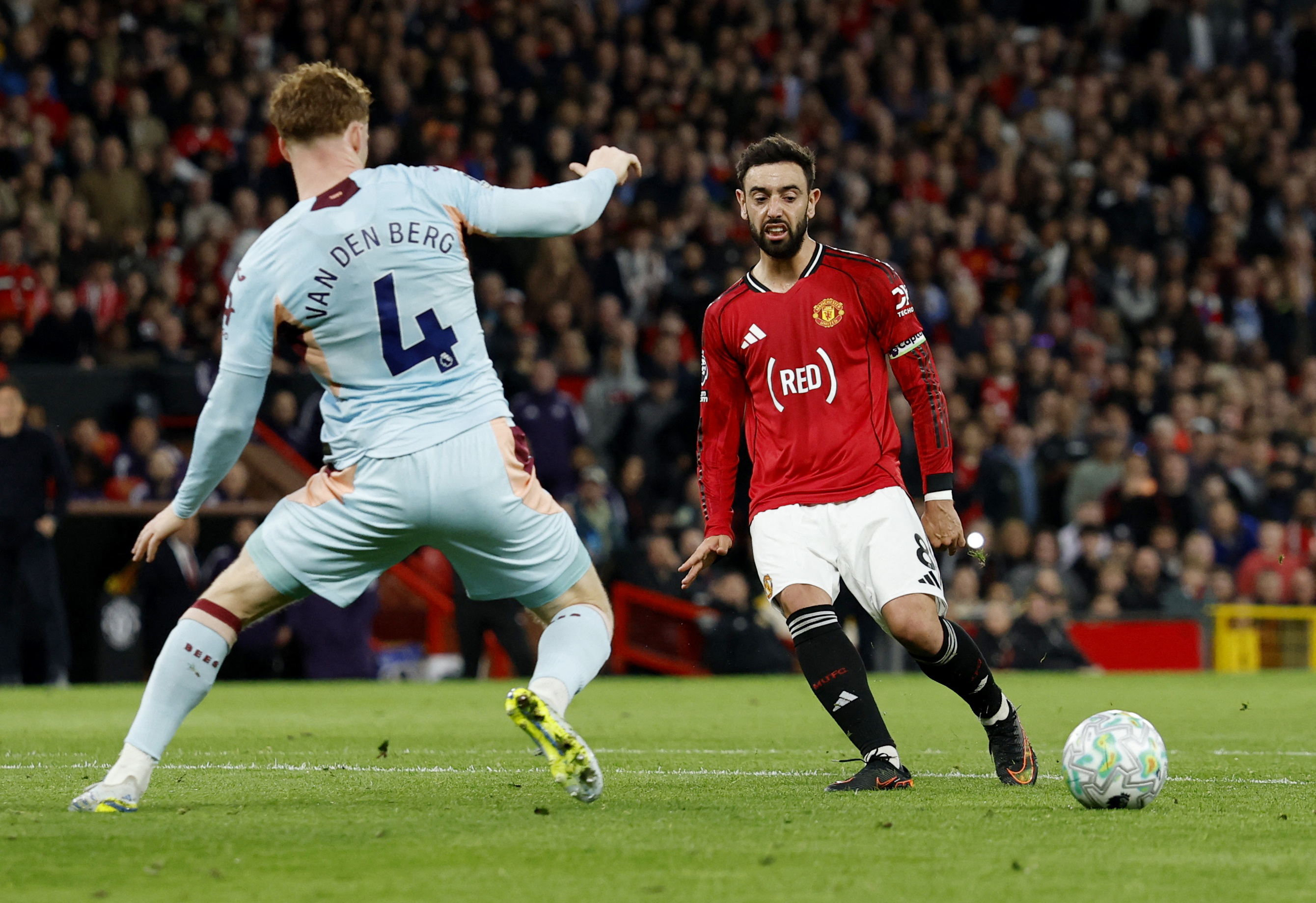Soccer Football - Premier League - Manchester United v Brentford - Old Trafford, Manchester, Britain - April 27, 2026 Brentford's Sepp van den Berg in action with Manchester United's Bruno Fernandes Action Images via Reuters/Jason Cairnduff EDITORIAL USE ONLY. NO USE WITH UNAUTHORIZED AUDIO, VIDEO, DATA, FIXTURE LISTS, CLUB/LEAGUE LOGOS OR 'LIVE' SERVICES. ONLINE IN-MATCH USE LIMITED TO 120 IMAGES, NO VIDEO EMULATION. NO USE IN BETTING, GAMES OR SINGLE CLUB/LEAGUE/PLAYER PUBLICATIONS. PLEASE CONTACT YOUR ACCOUNT REPRESENTATIVE FOR FURTHER DETAILS..
