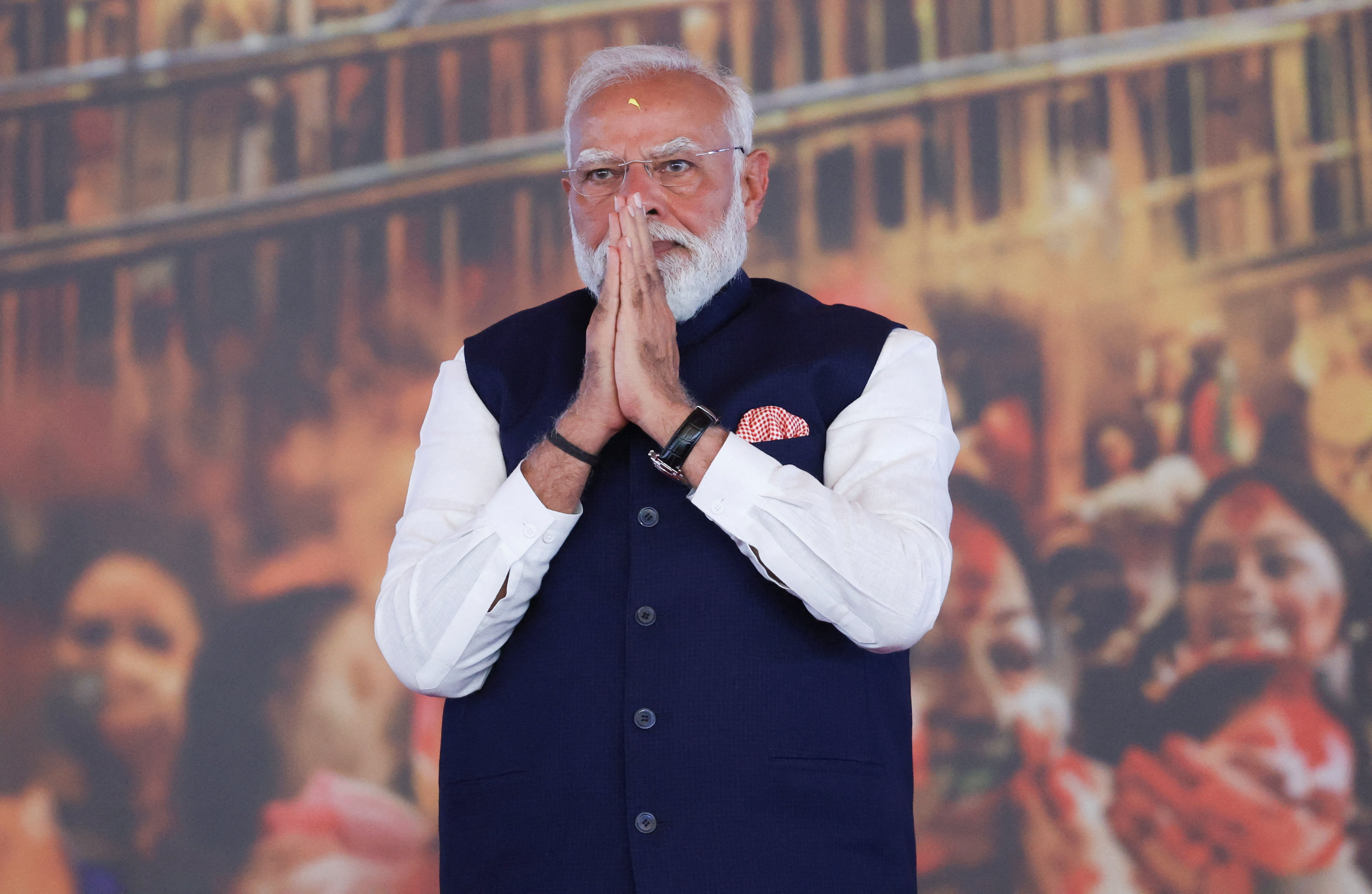 India's Prime Minister Narendra Modi gesutres as he attends a swearing-in ceremony of Suvendu Adhikari as the Chief Minister of West Bengal, at the Brigade Parade Ground in Kolkata, India, May 9, 2026. REUTERS/Sahiba Chawdhary