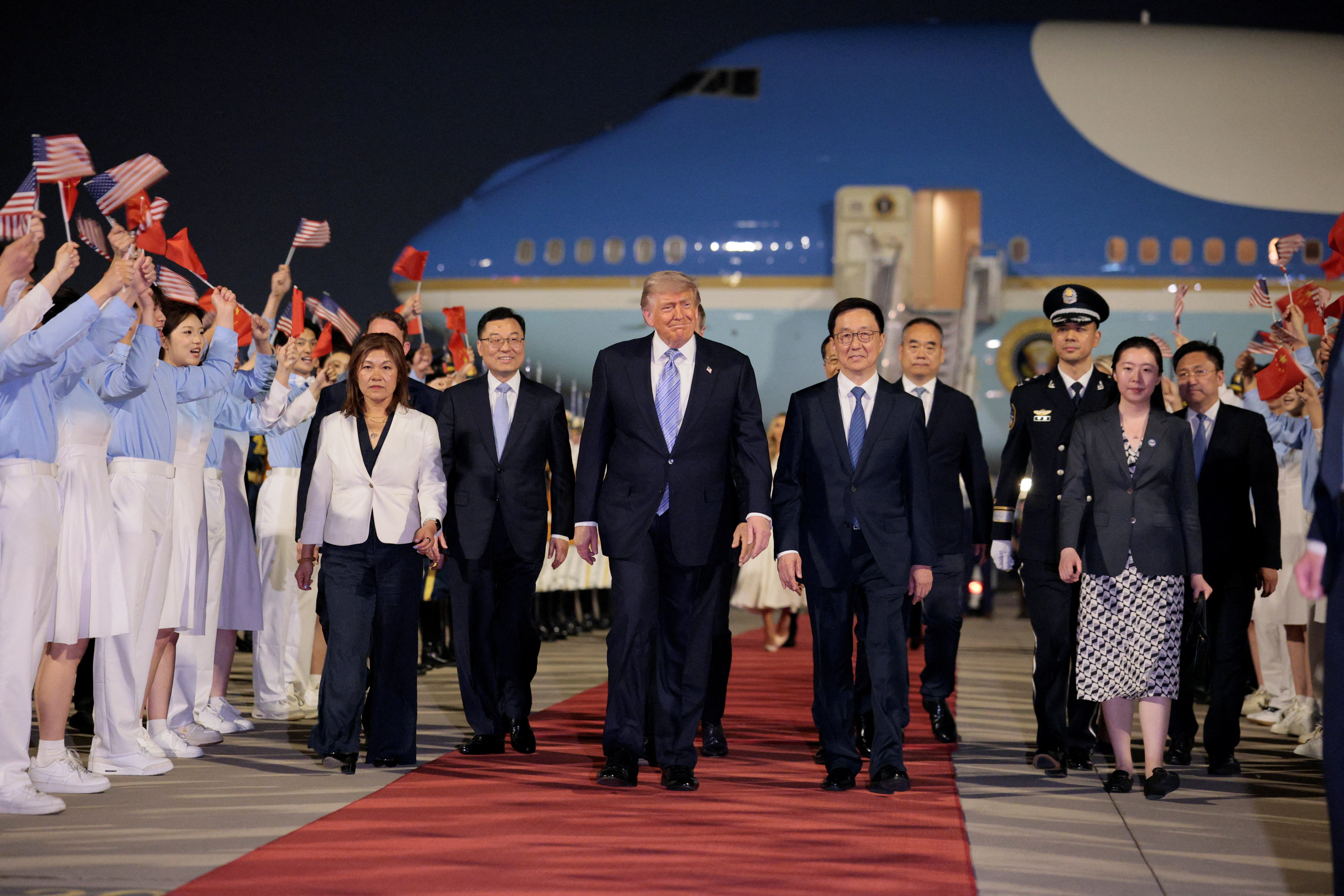 U.S. President Donald Trump participates in an arrival ceremony at Beijing Capital International Airport during his visit to the country, in Beijing, China, May 13, 2026. REUTERS/Evan Vucci
