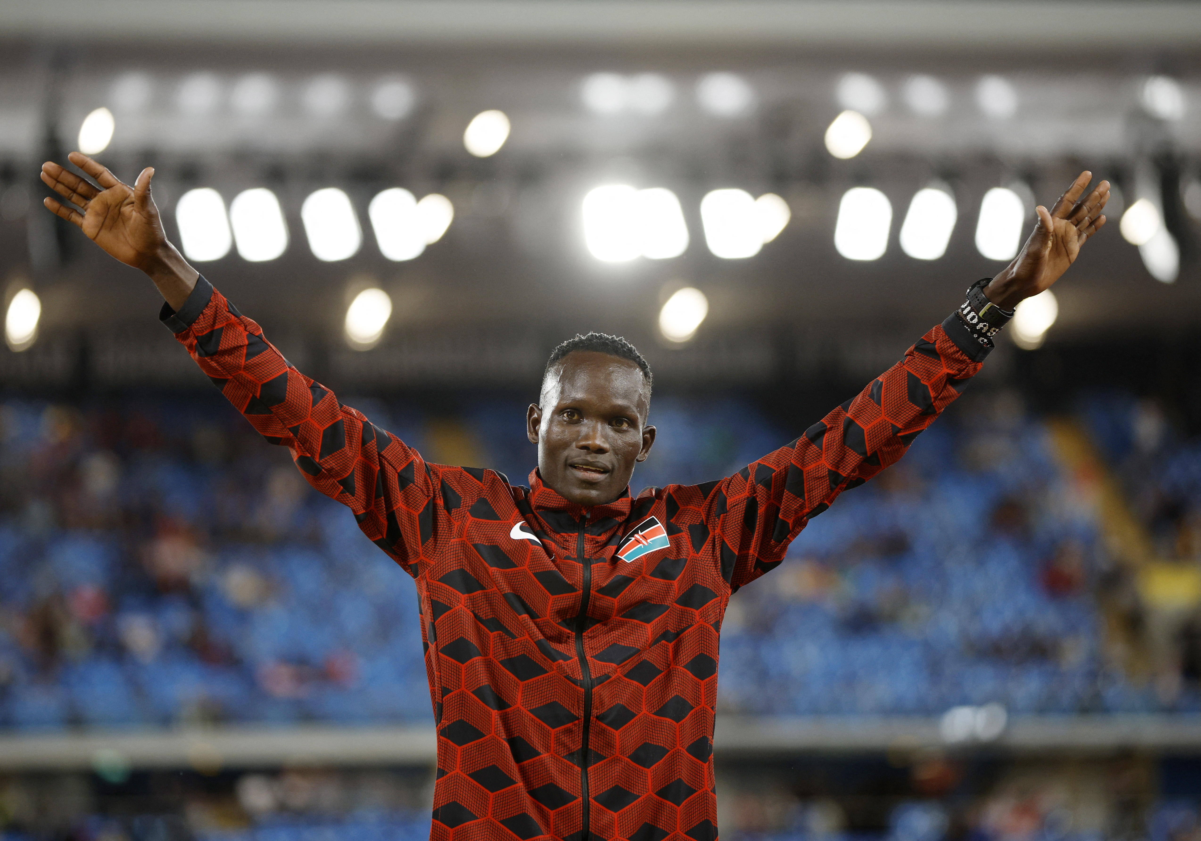 Bronze medallist Kenya's Kibiwott Kandie celebrates on the podium