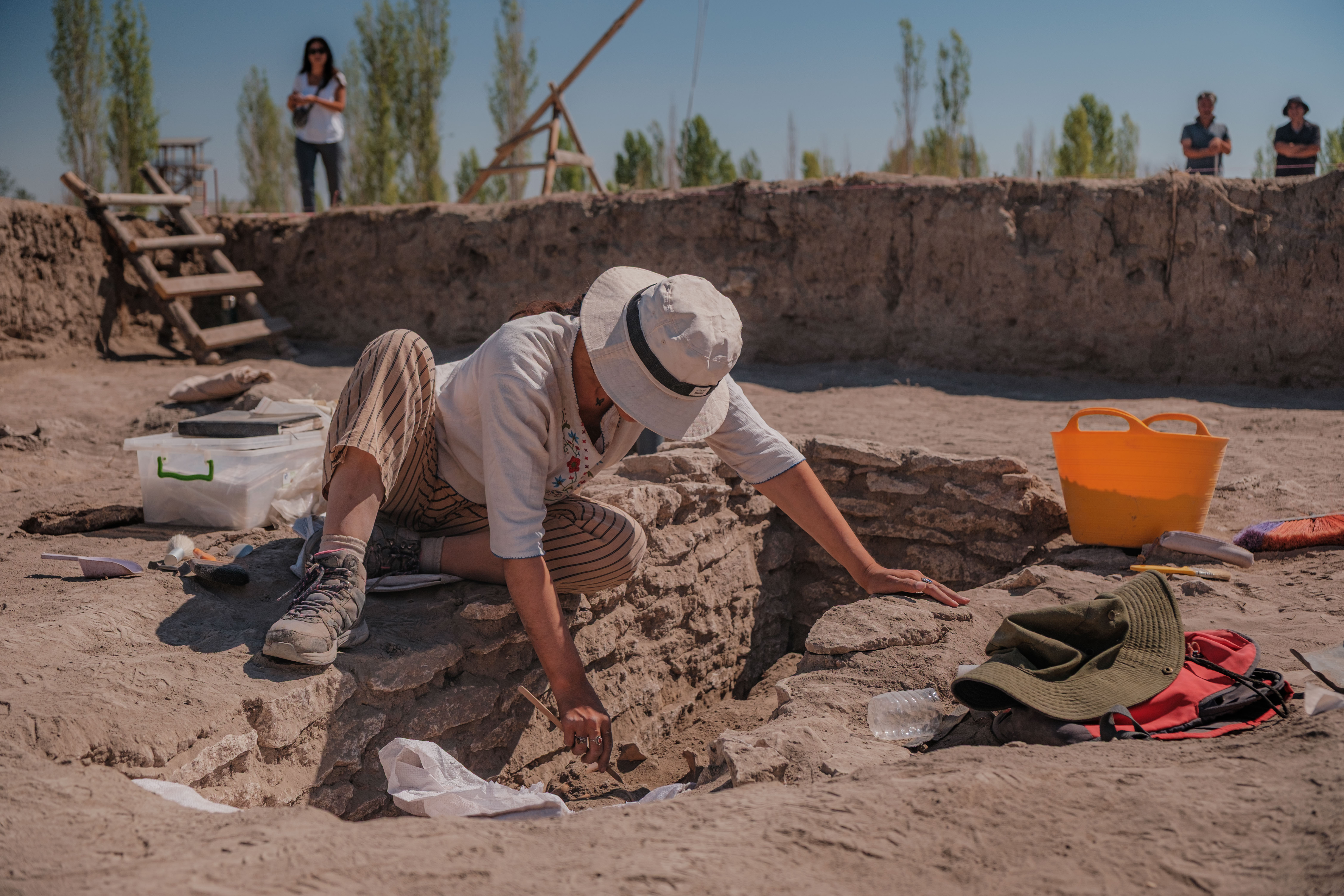 An archaeologist is seen working at the excavation site of Catalhoyuk, Turkiye [Can Erok/Al Jazeera]