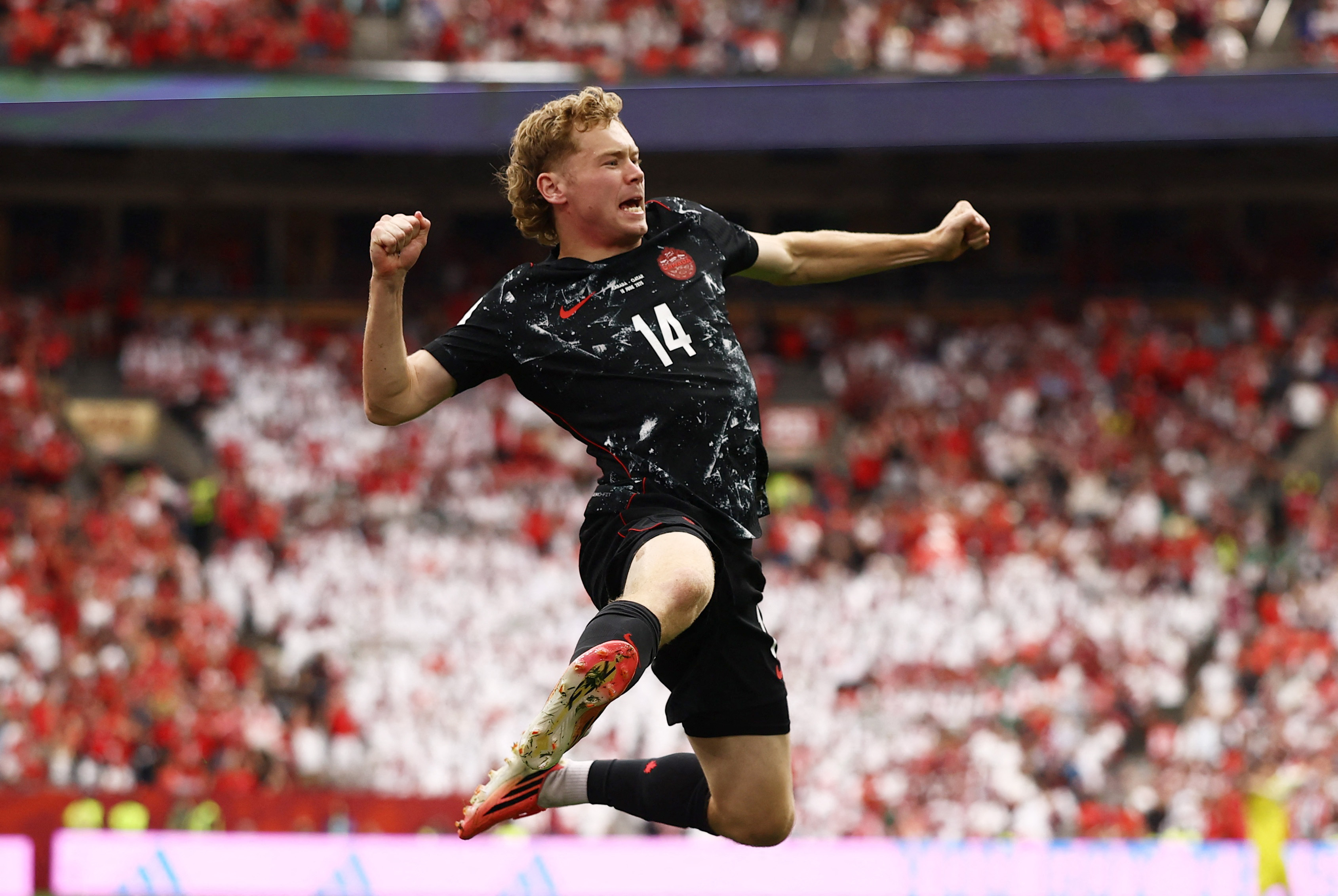 Soccer Football - FIFA World Cup 2026 - Group B - Canada v Qatar - BC Place, Vancouver, Canada - June 18, 2026 Canada's Jacob Shaffelburg celebrates their fifth goal, an own goal scored by Qatar's Mohamed Manai REUTERS/Lee Smith
