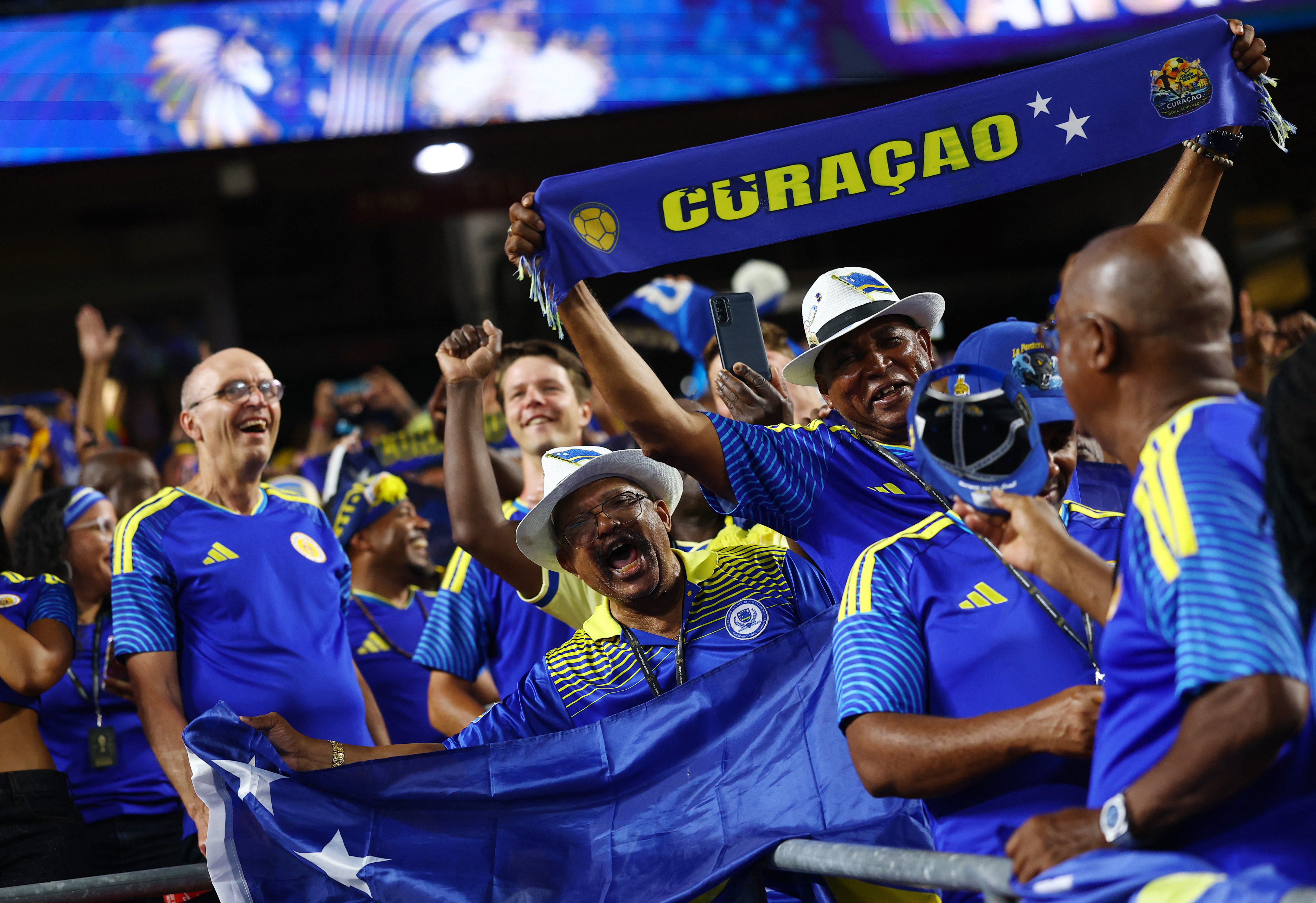 Soccer Football - FIFA World Cup 2026 - Group E - Ecuador v Curacao - Kansas City Stadium, Kansas City, Missouri, U.S. - June 20, 2026 Curacao fans celebrate after the match REUTERS/Hannah Mckay