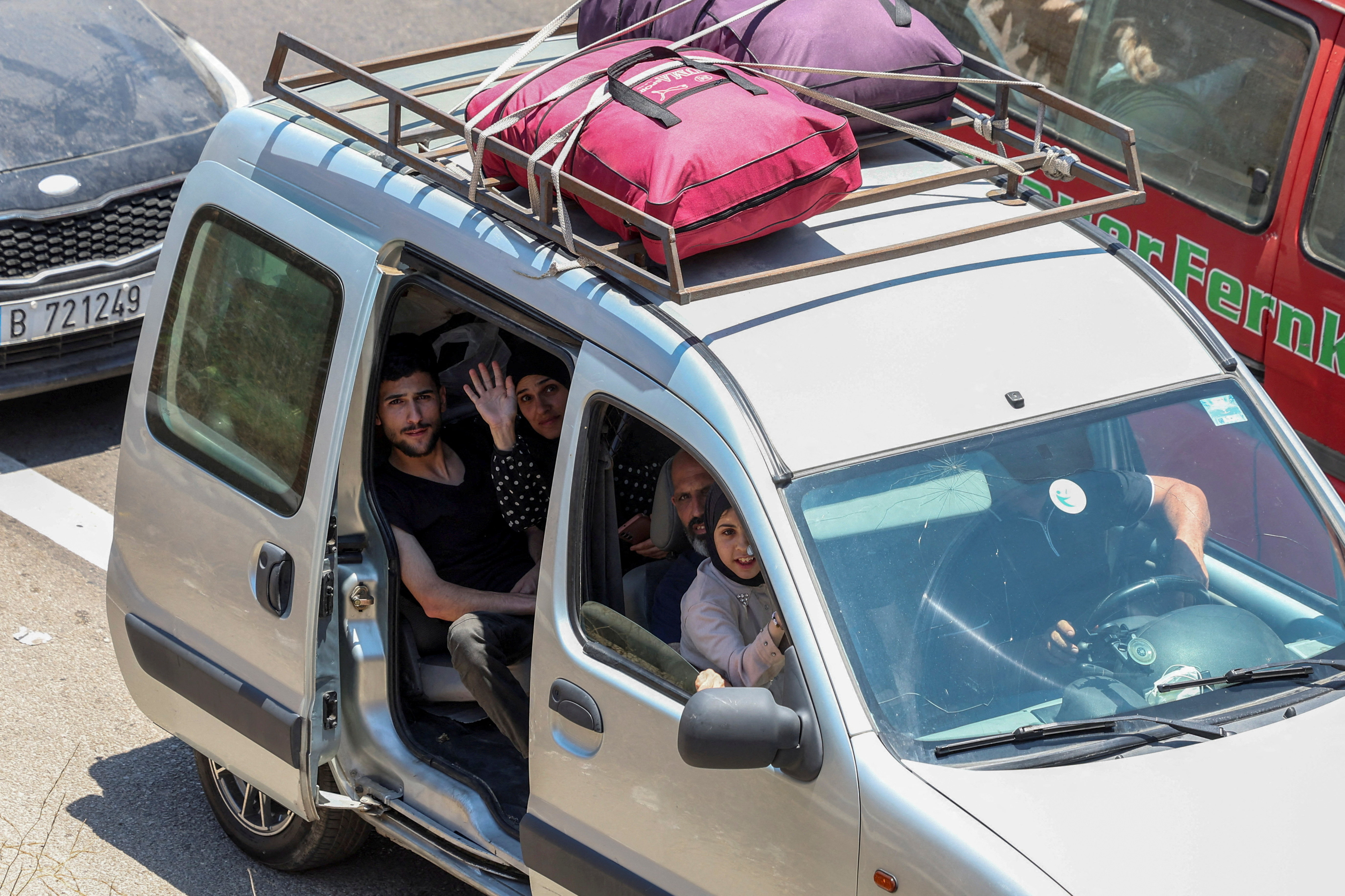 Displaced people make their way back to their homes in southern Lebanon following an interim deal between the U.S. and Iran, in Sidon, Lebanon, June 23, 2026.
