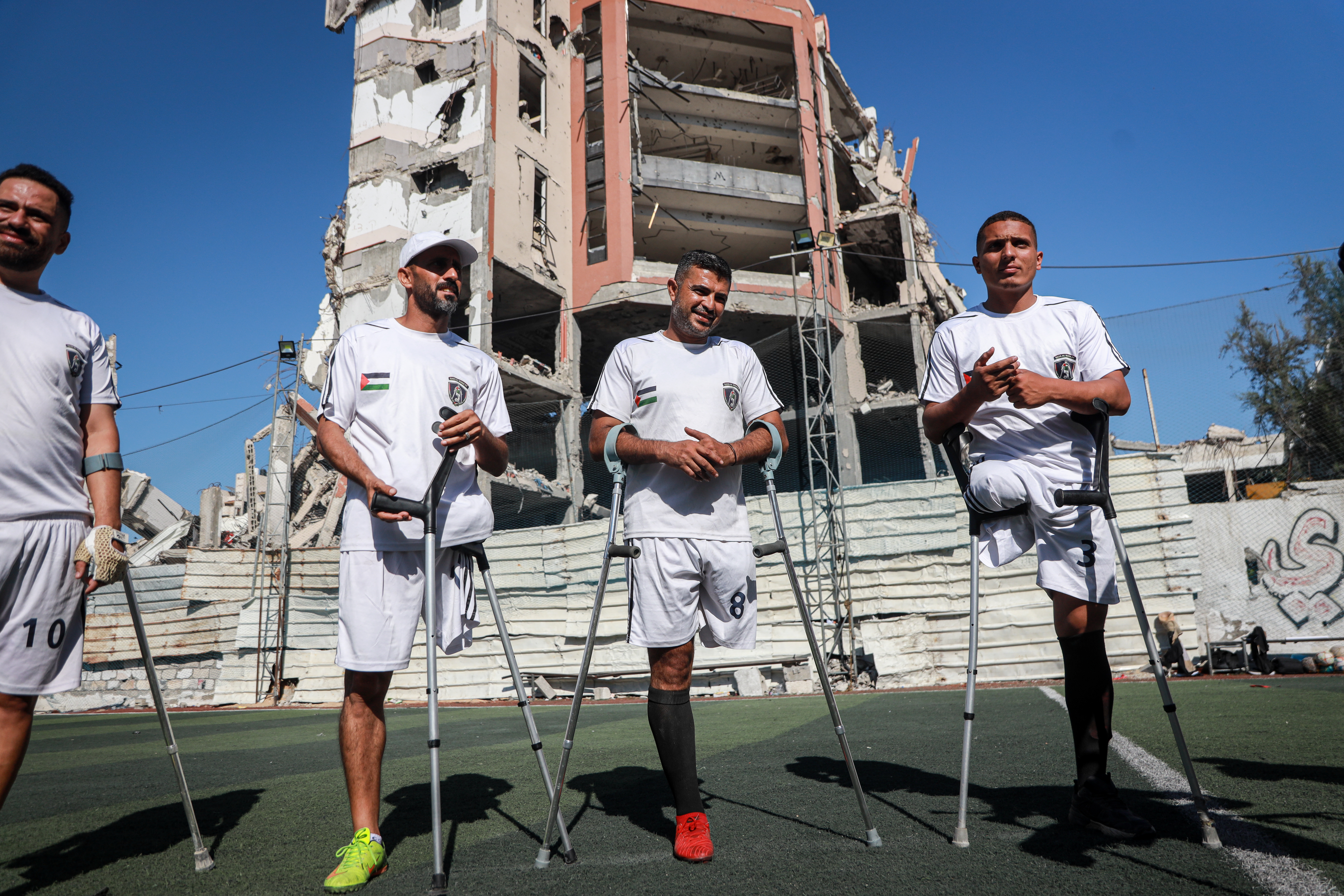 Members of Gaza’s Al-Irada (Gaza Will) team train at one of the few remaining sports fields in Gaza City, amid a severe shortage of sports facilities and equipment [Abdelhakim Abu Riash/ Al Jazeera]