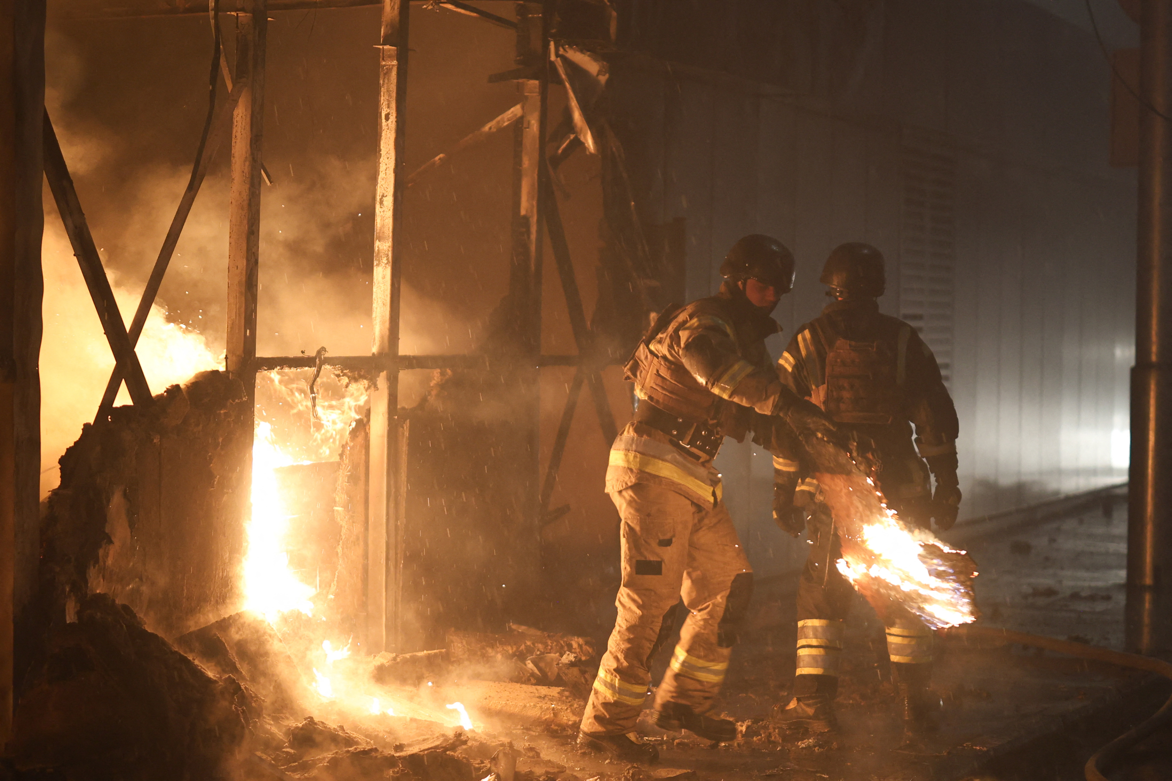 Kyiv cathedral burns as heavy Russian air raids hit Ukraine