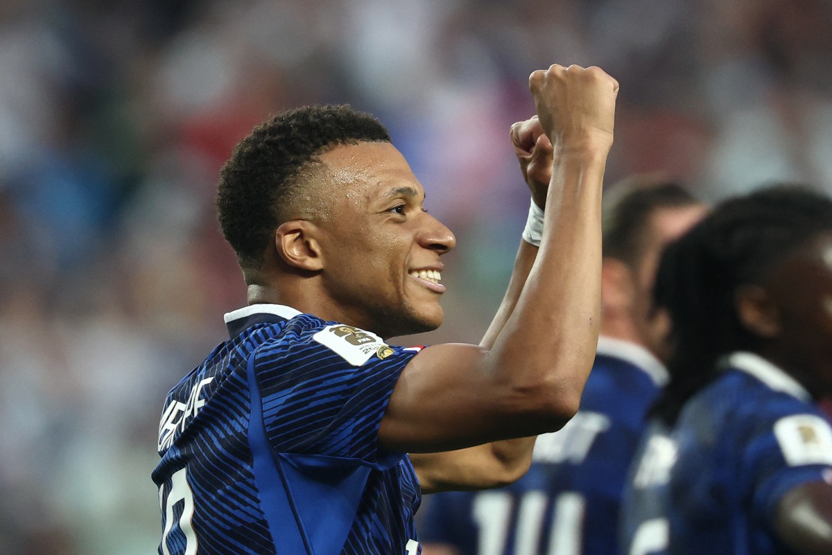 France's forward #10 Kylian Mbappe celebrates scoring his team's second goal during the 2026 World Cup Group I football match