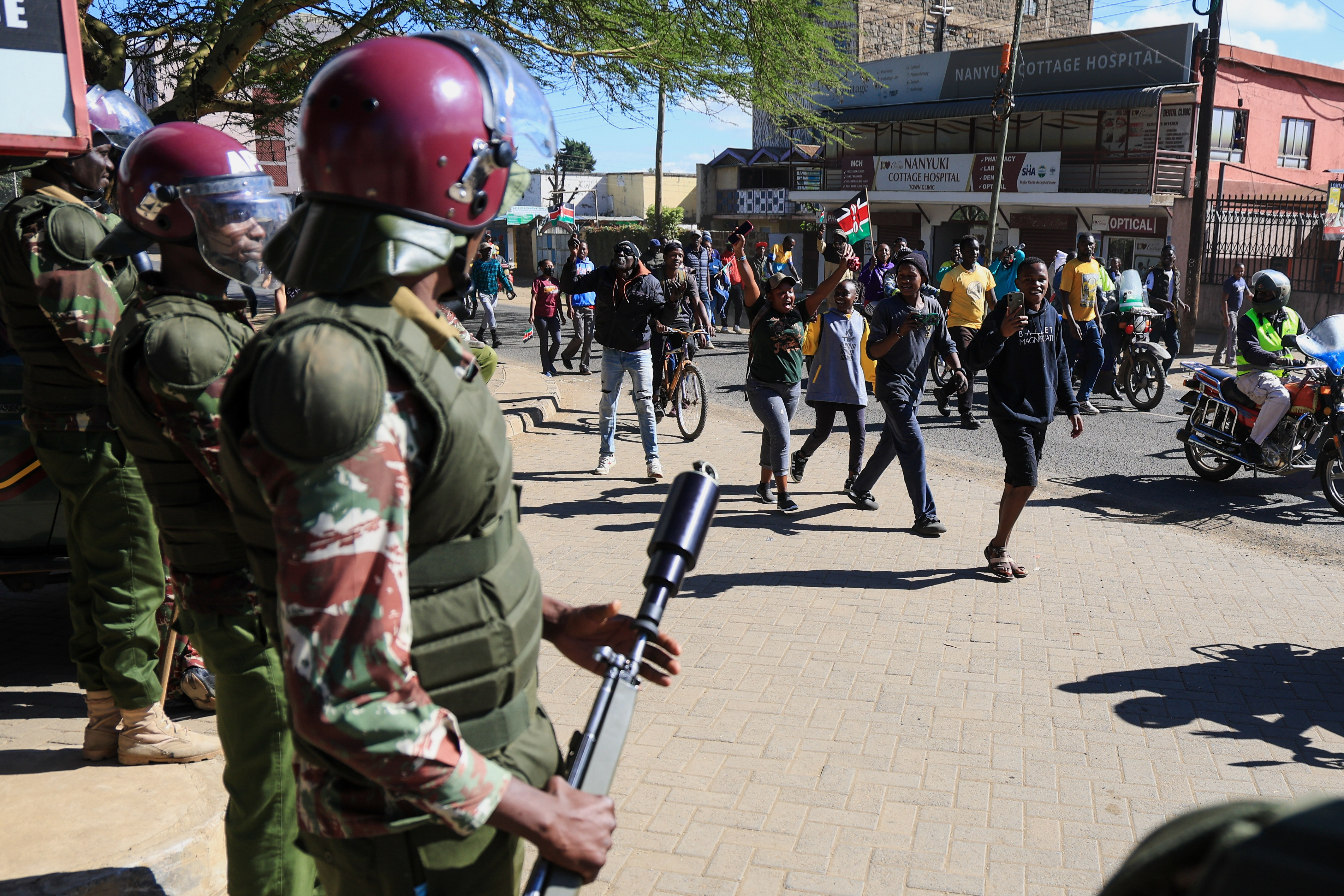 Anti-riot police officers stand by as demonstrators protest against a proposed Ebola quarantine centre to be established by the United States at Laikipia Air Base in Nanyuki, Kenya, Monday, June 1, 2026