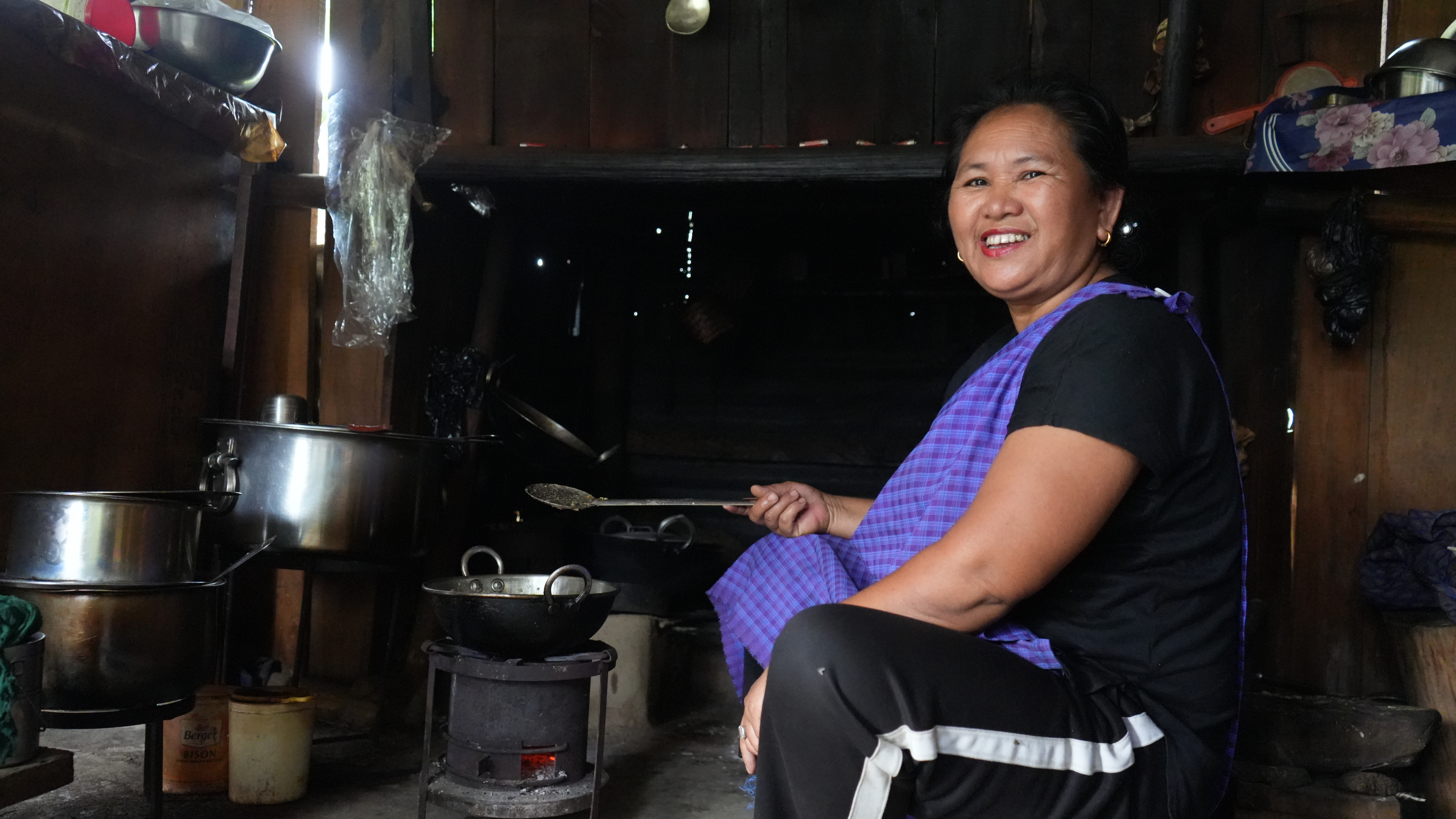 Wanley frying cicada in her shop.