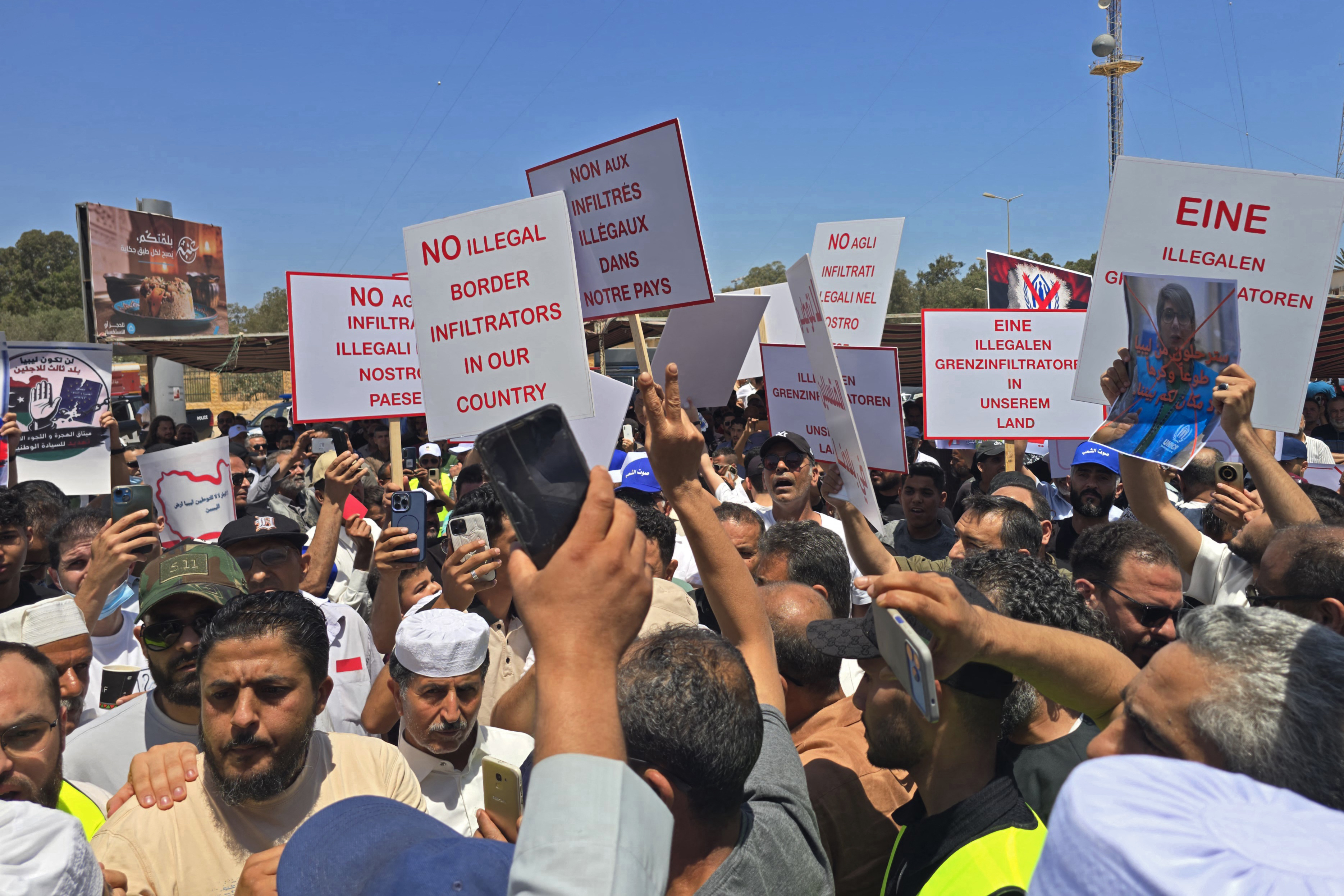 Libyans take part in a demonstration in front of the UNHCR office in Tripoli on June 4, 2026, demanding the departure and closure of the UNHCR offices and declaring ‘No to foreign settlement in Libya’ [AFP]