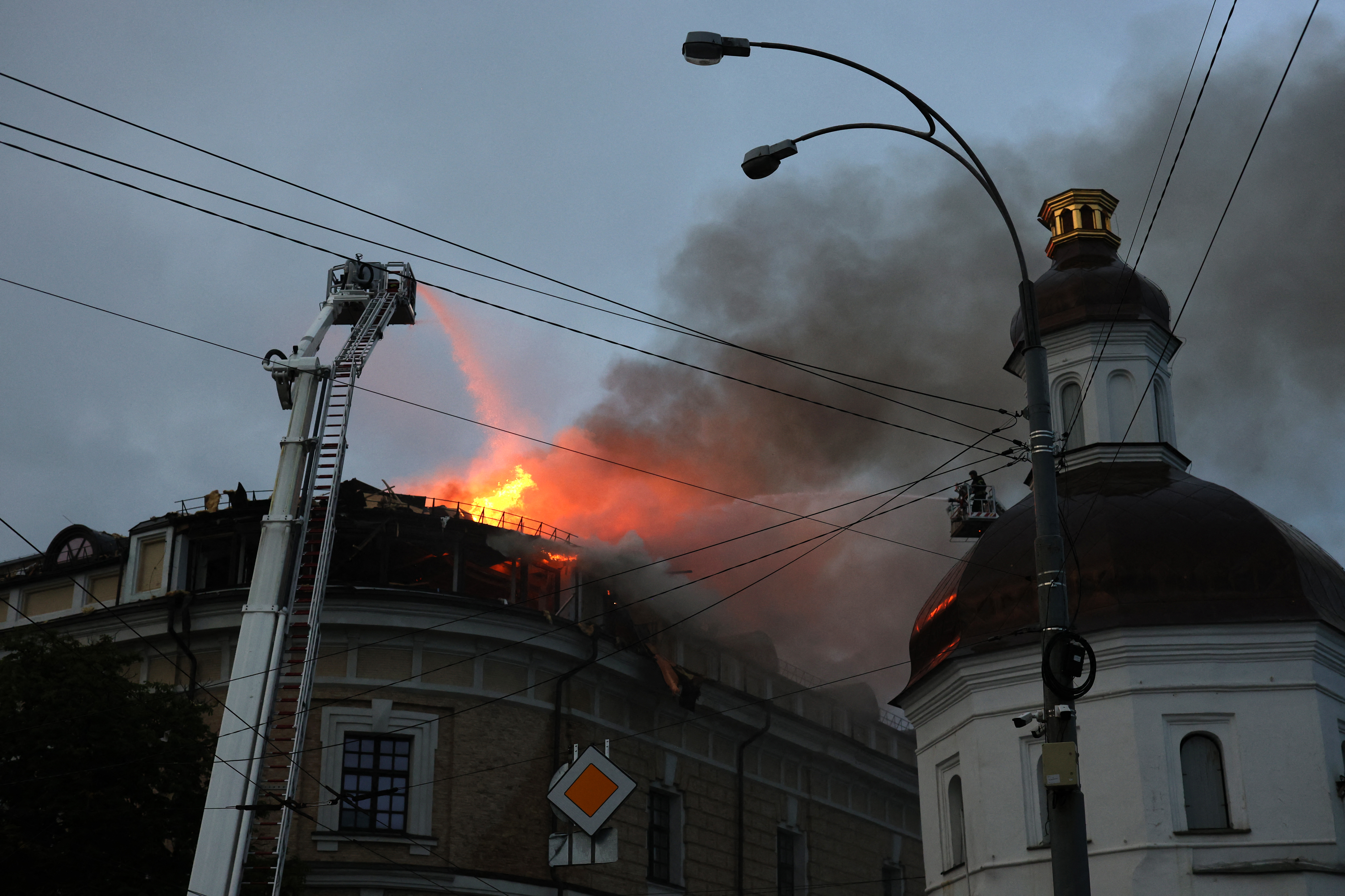 First responders put out a fire in the Mystetskyi Arsenal National Art and Culture Museum Complex, Ukraine's flagship public cultural institution, following a Russian missile strike in Kyiv on June 15, 2026, amid the Russian invasion in Ukraine.