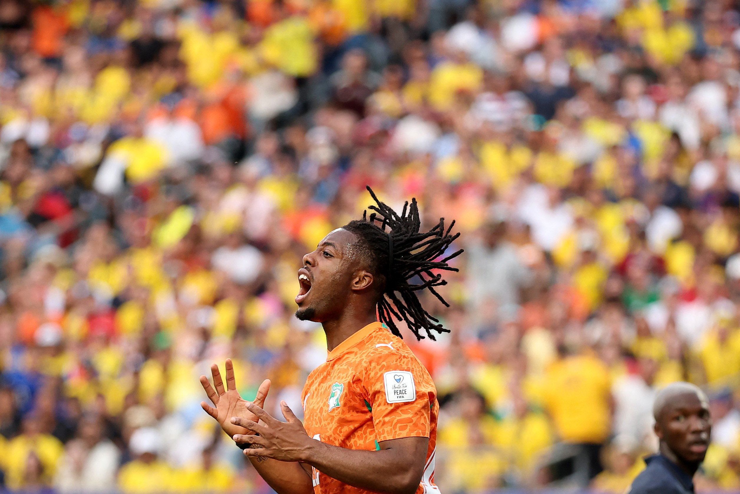 TOPSHOT - PHILADELPHIA, PENNSYLVANIA - JUNE 14: Elye Wahi #12 of Cote d'Ivoire reacts missing a chance during the FIFA World Cup 2026 Group E match between Cote D'Ivoire and Ecuador at Philadelphia Stadium on June 14, 2026 in Philadelphia, Pennsylvania. Darrian Traynor/Getty Images/AFP (Photo by Darrian Traynor / GETTY IMAGES NORTH AMERICA / Getty Images via AFP)