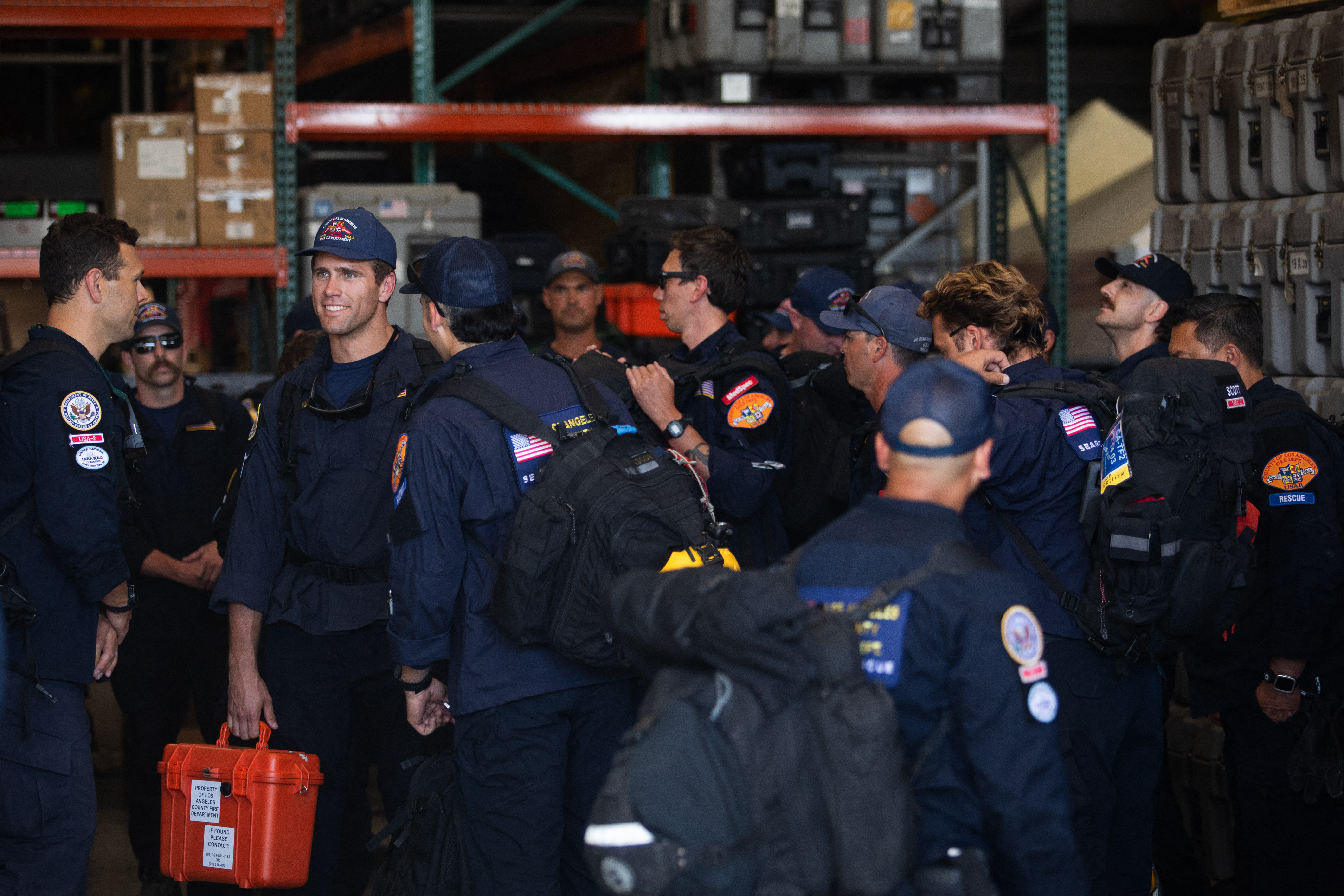 Members of the County of Los Angeles Fire Department’s international urban search and rescue team (USA-2) prepare to leave for Venezuela, in Pacoima, California on June 25, 2026.