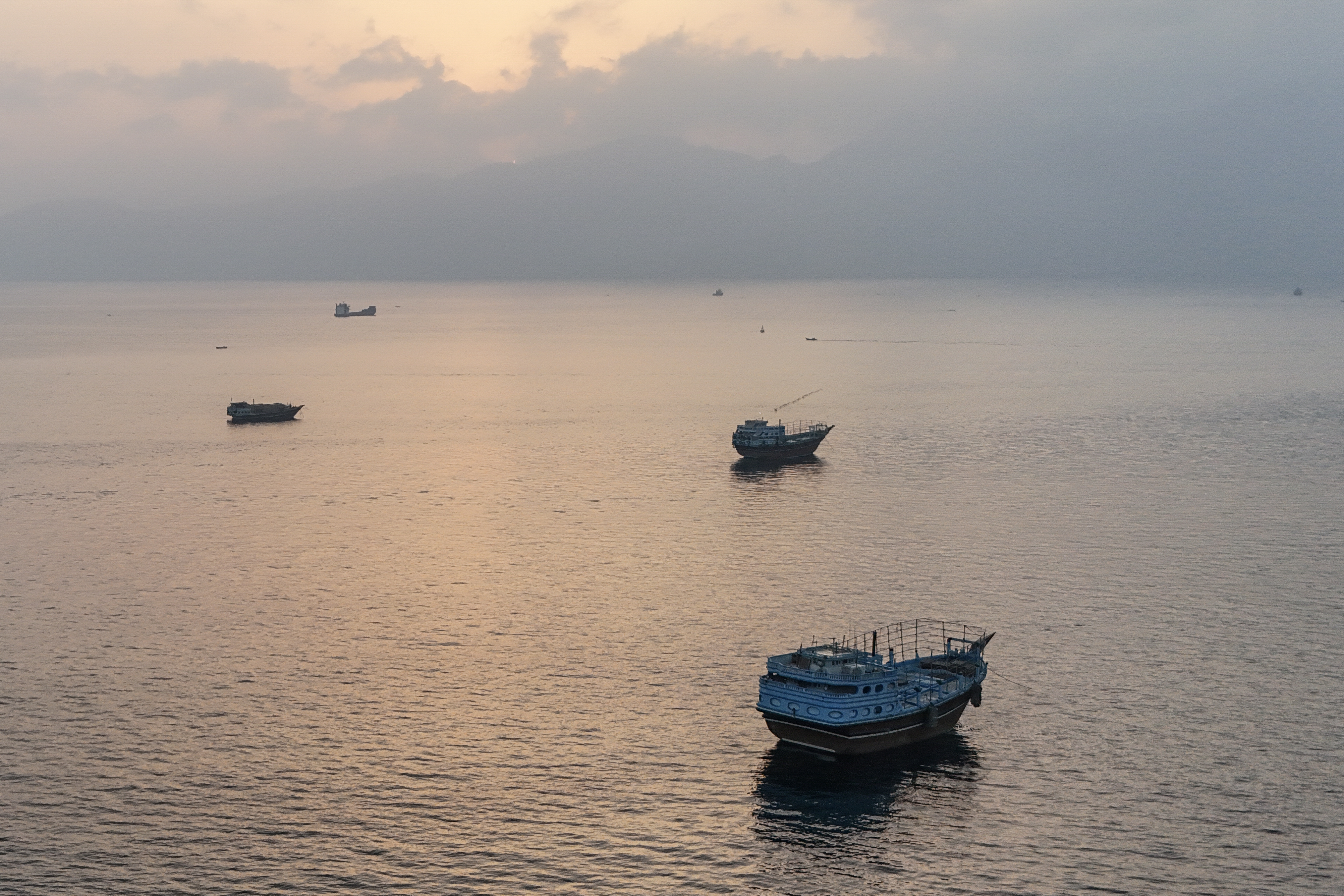 Boats anchored at sea.