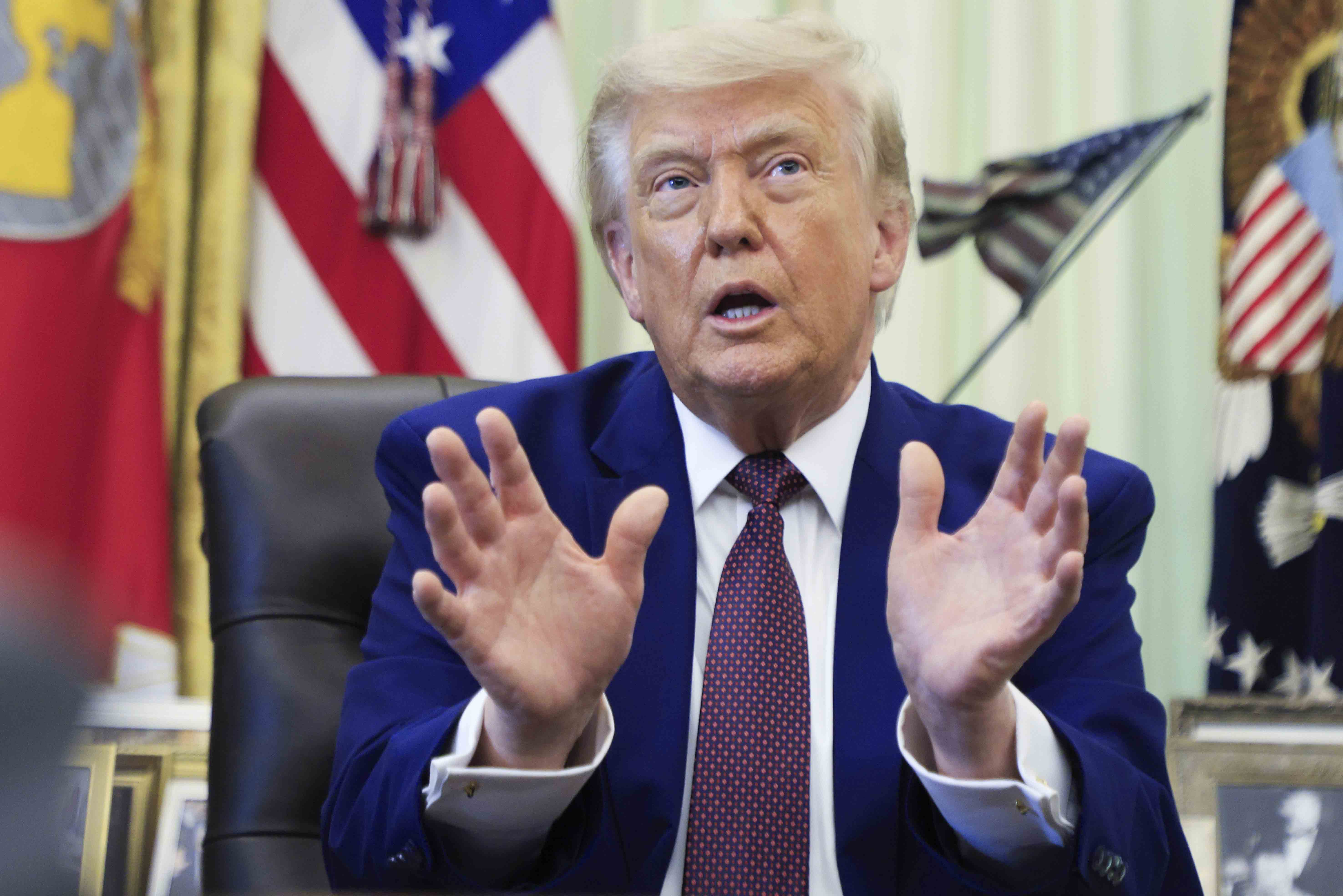 epa13014161 US President Donald J. Trump responds to a question from the news media during an executive order signing ceremony in the Oval Office of the White House in Washington, DC, USA, 03 June 2026. US President Trump signed executive orders on the federal workforce and immigration. EPA/SHAWN THEW / POOL
