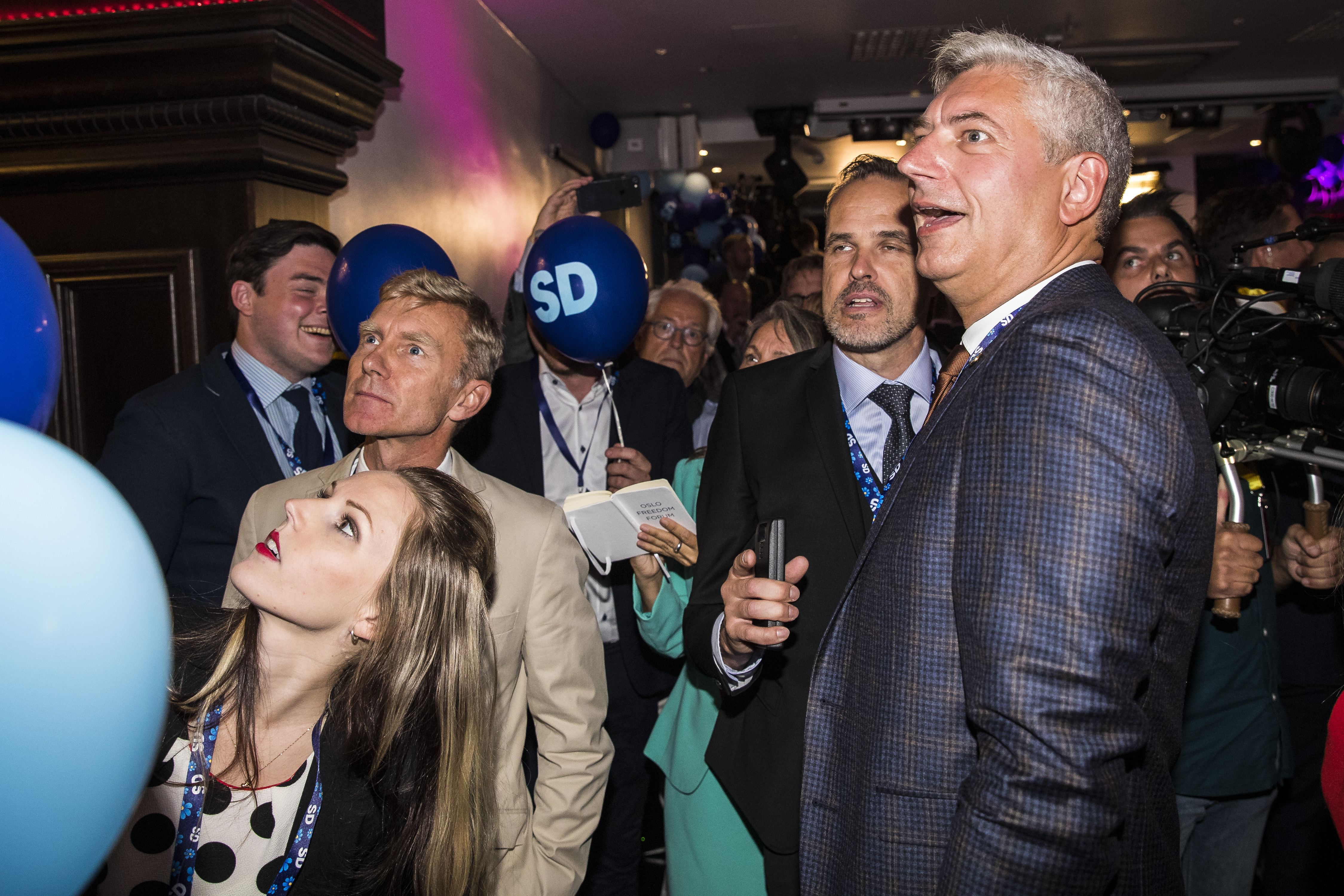 STOCKHOLM, SWEDEN - SEPTEMBER 09: Members and supporters of the far-right Sweden Democrats react to the results of the exit polls at their party election center on September 9, 2018 in Stockholm, Sweden. Swedes have headed to the polls in a tightly contested general election where immigration has been a central issue of a heated campaign and which could see the far-right Sweden Democrats make significant gains. (Photo by Michael Campanella/Getty Images)