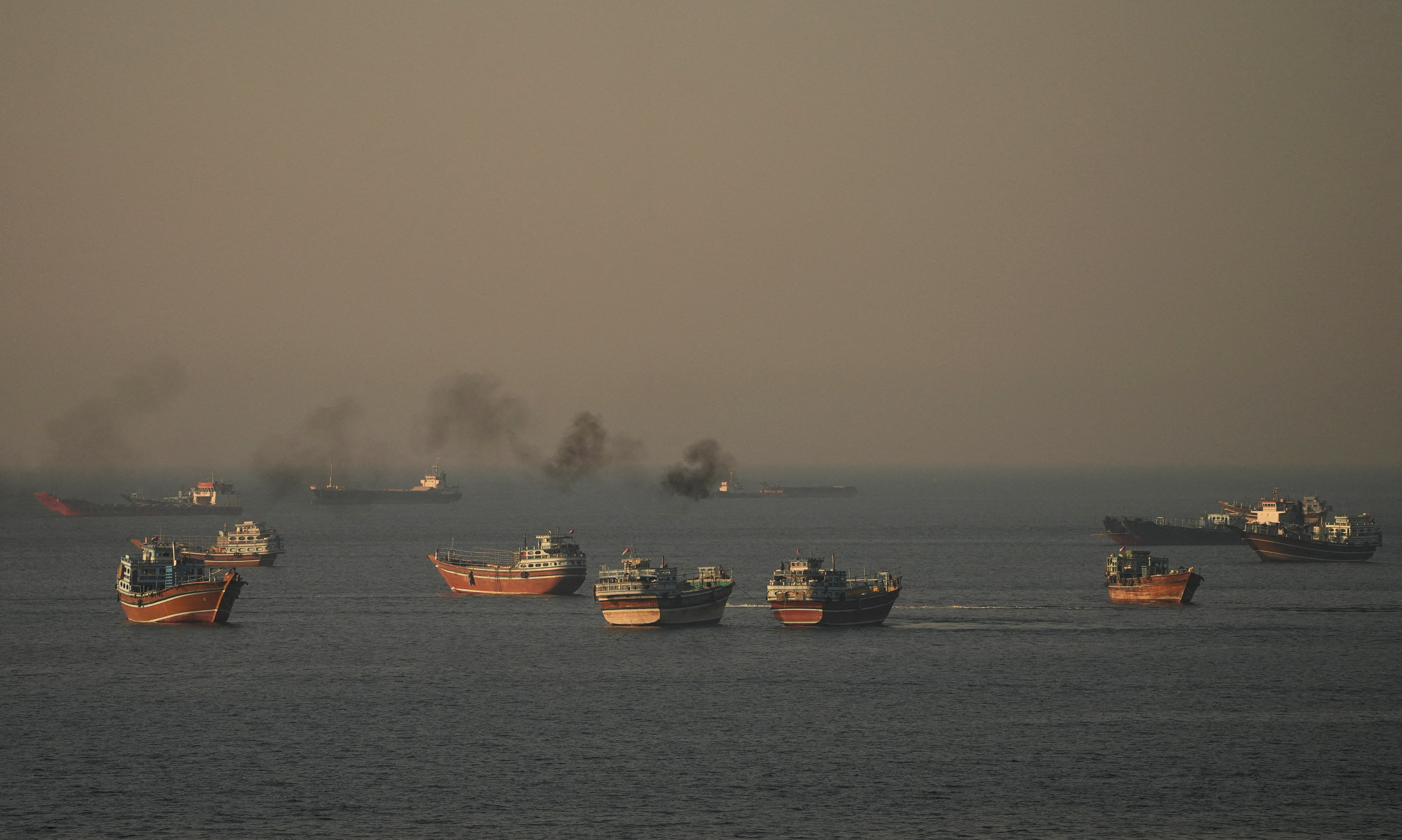 Vessels at the Strait of Hormuz, as seen from Musandam, Oman, June 15, 2026. REUTERS/Stringer