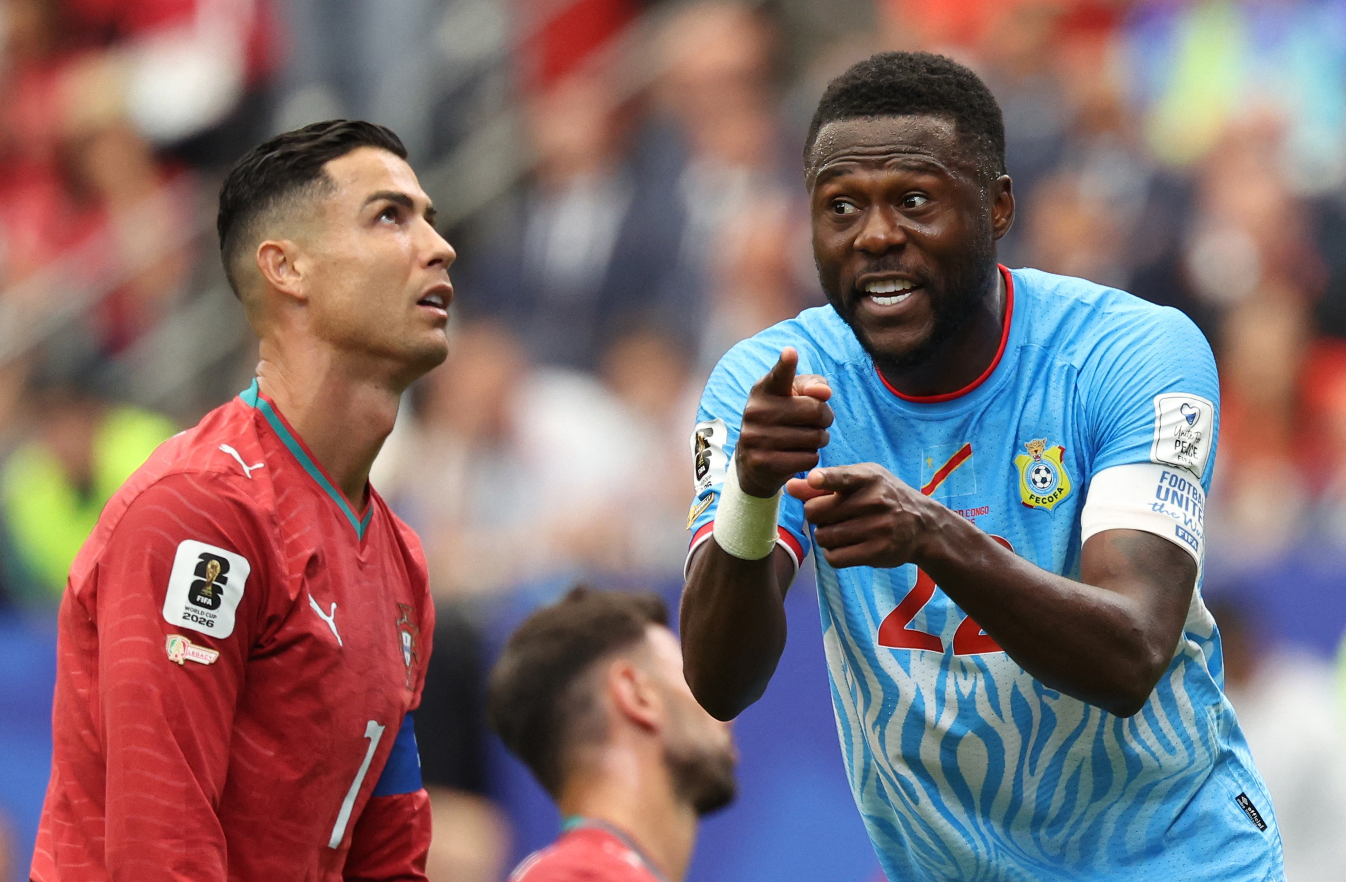 Soccer Football - FIFA World Cup 2026 - Group K - Portugal v DR Congo - Houston Stadium, Houston, Texas, U.S. - June 17, 2026 Portugal's Cristiano Ronaldo and DR Congo's Chancel Mbemba react IMAGN IMAGES via Reuters/Troy Taormina