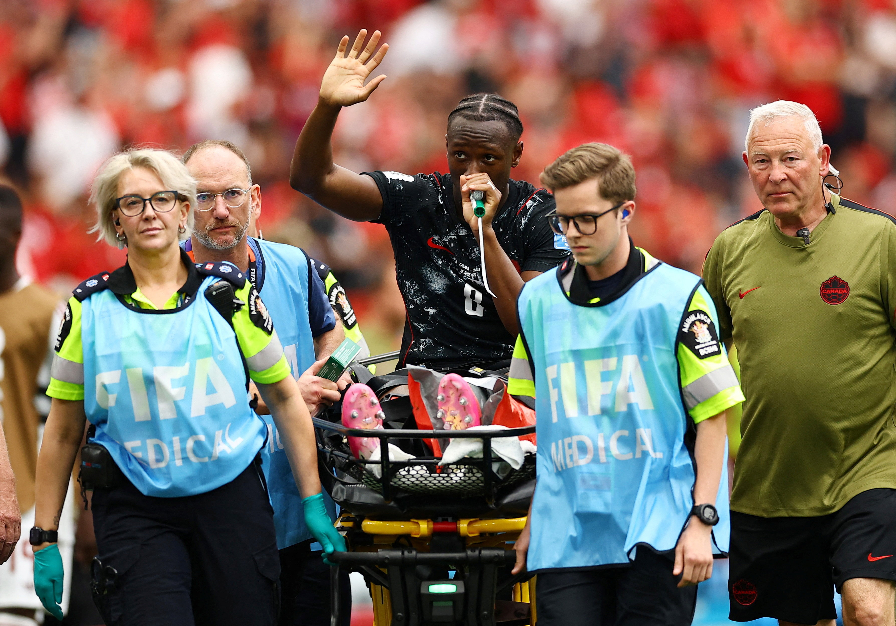 Soccer Football - FIFA World Cup 2026 - Group B - Canada v Qatar - BC Place, Vancouver, Canada - June 18, 2026 Canada's Ismael Kone waves to the crowd as he receives oxygen as he is stretchered off after sustaining an injury REUTERS/Agustin Marcarian TPX IMAGES OF THE DAY