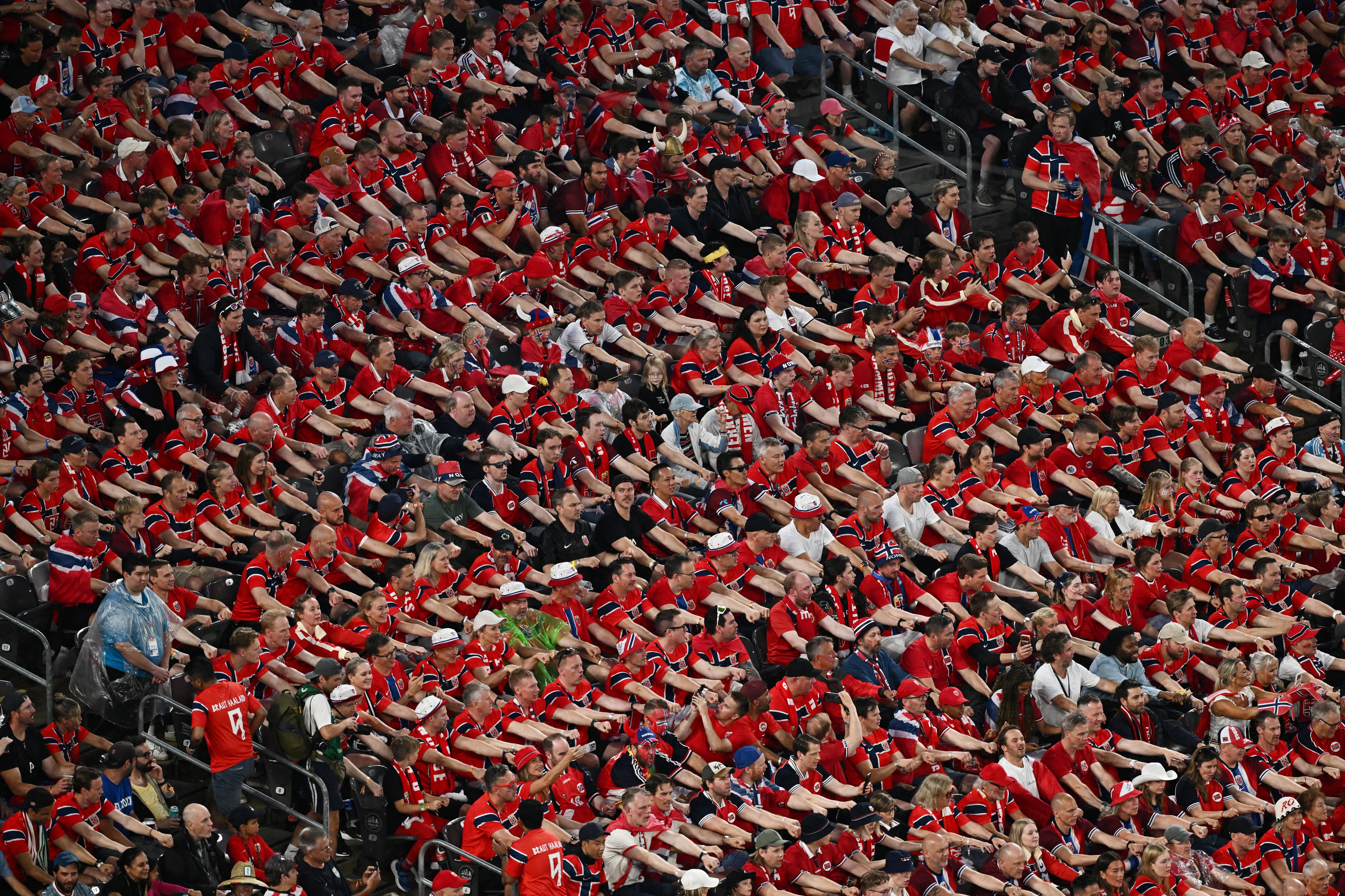 Soccer Football - FIFA World Cup 2026 - Group I - Norway v Senegal - New York/New Jersey Stadium, East Rutherford, New Jersey, U.S. - June 22, 2026 Norway fans do the traditional rowing celebration in the stands REUTERS/Dylan Martinez TPX IMAGES OF THE DAY