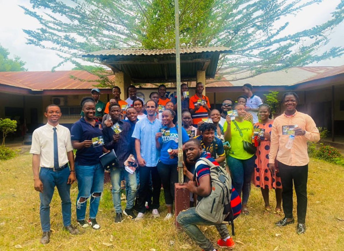 Participants in an Archive Liberia oral history project pose for a group photograph