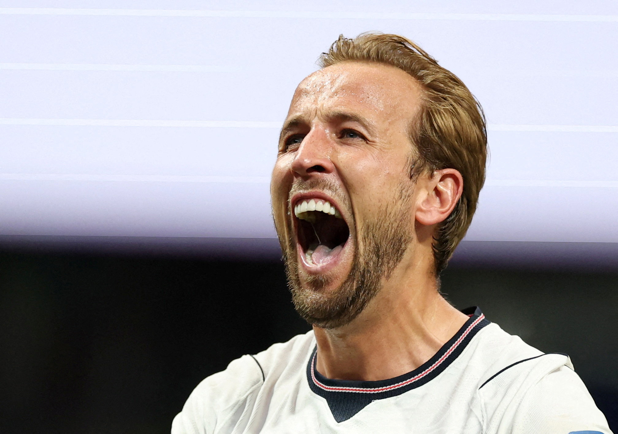 England’s Harry Kane celebrates after the match as England qualify for the round of 16