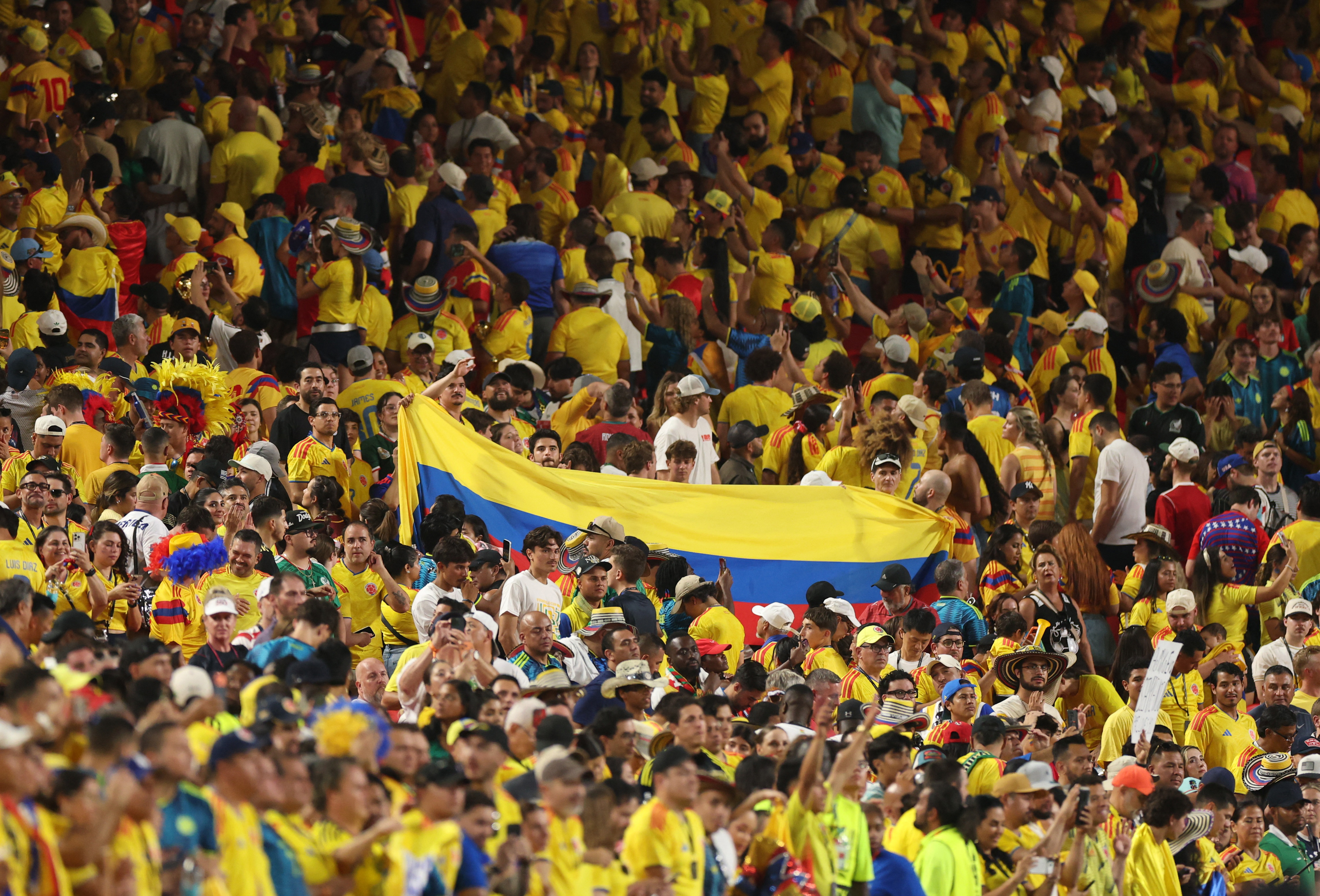 Soccer Football - FIFA World Cup 2026 - Round of 32 - Colombia v Ghana - Kansas City Stadium, Kansas City, Missouri, U.S. - July 3, 2026 Colombia fans celebrate after the match as Colombia qualify for the Round of 16 stage of the World Cup REUTERS/Siphiwe Sibeko