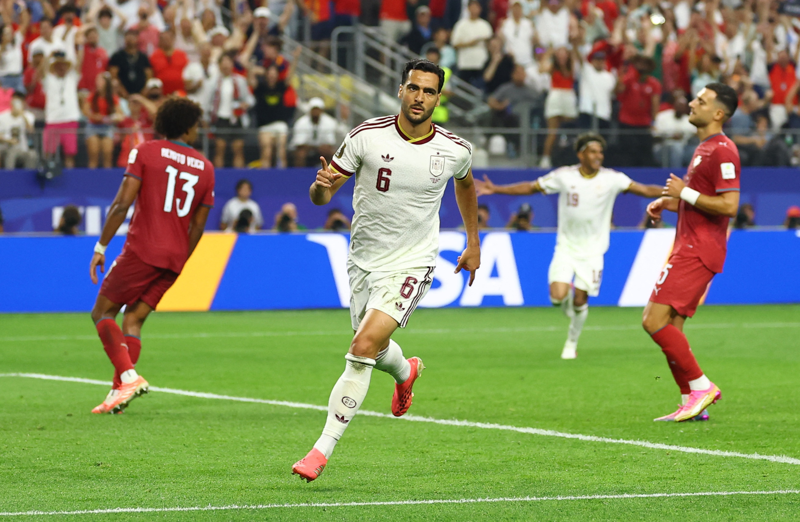 Spain's Mikel Merino celebrates scoring their first goa