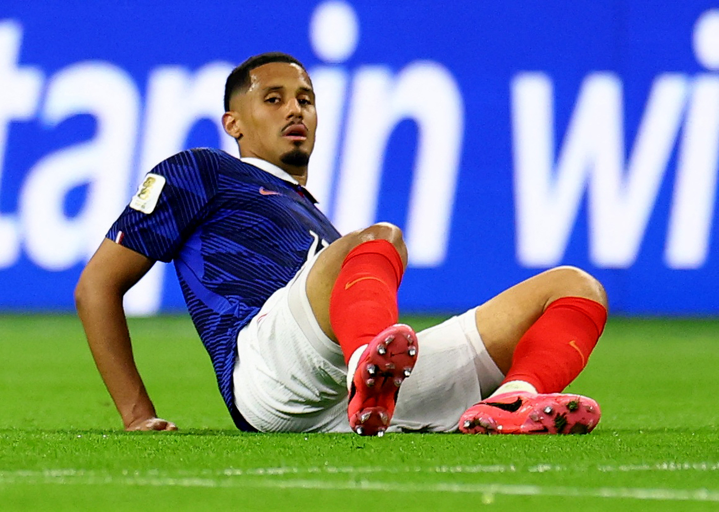 Soccer Football - FIFA World Cup 2026 - Semi Final - France v Spain - Dallas Stadium, Arlington, Texas, U.S. - July 14, 2026 France's William Saliba reacts after sustaining an injury REUTERS/Hannah Mckay