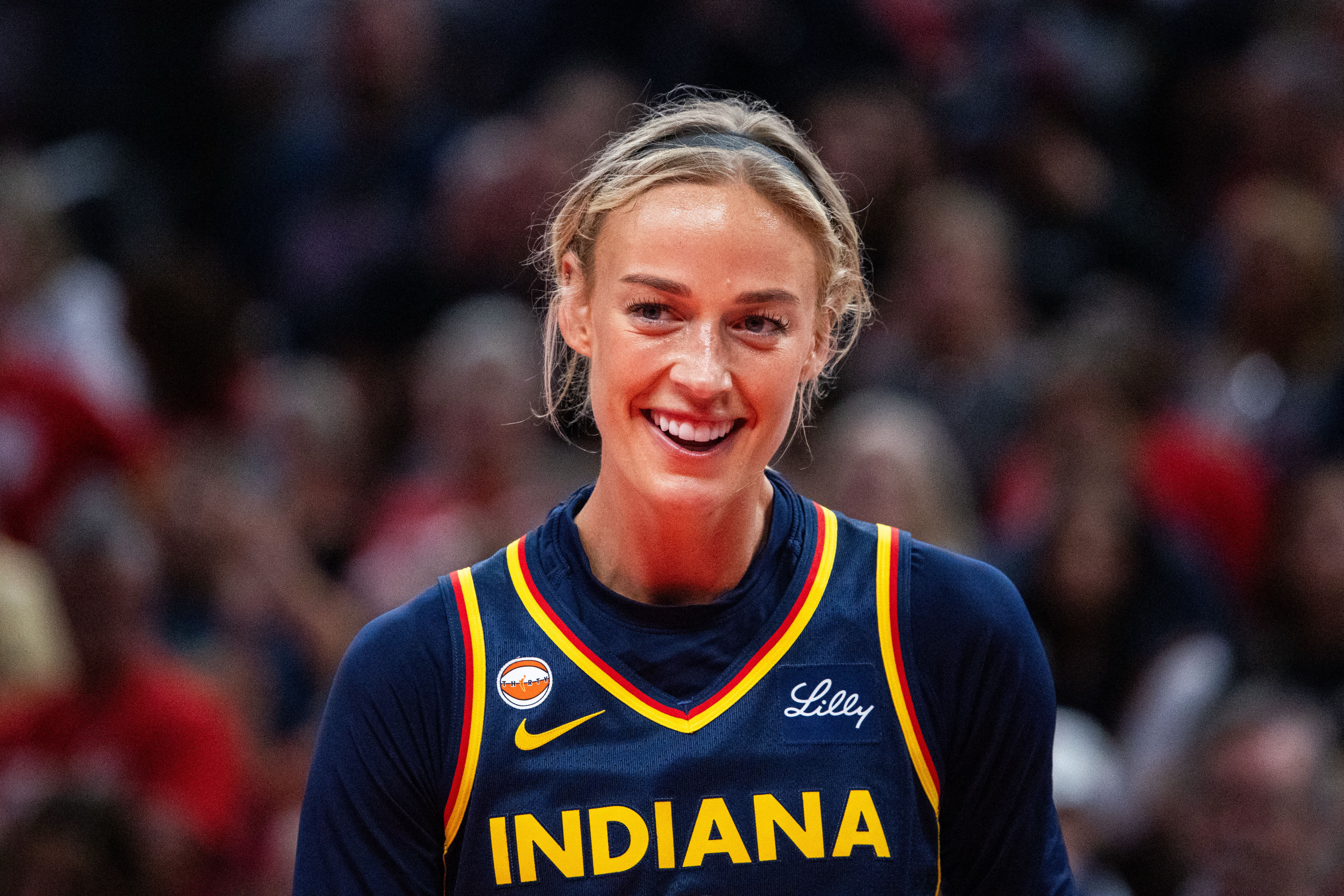 Fan hold a Indiana Fever guard Sophie Cunningham (8) (not pictured) sign during the first half between the Seattle Storm and the Indiana Fever
