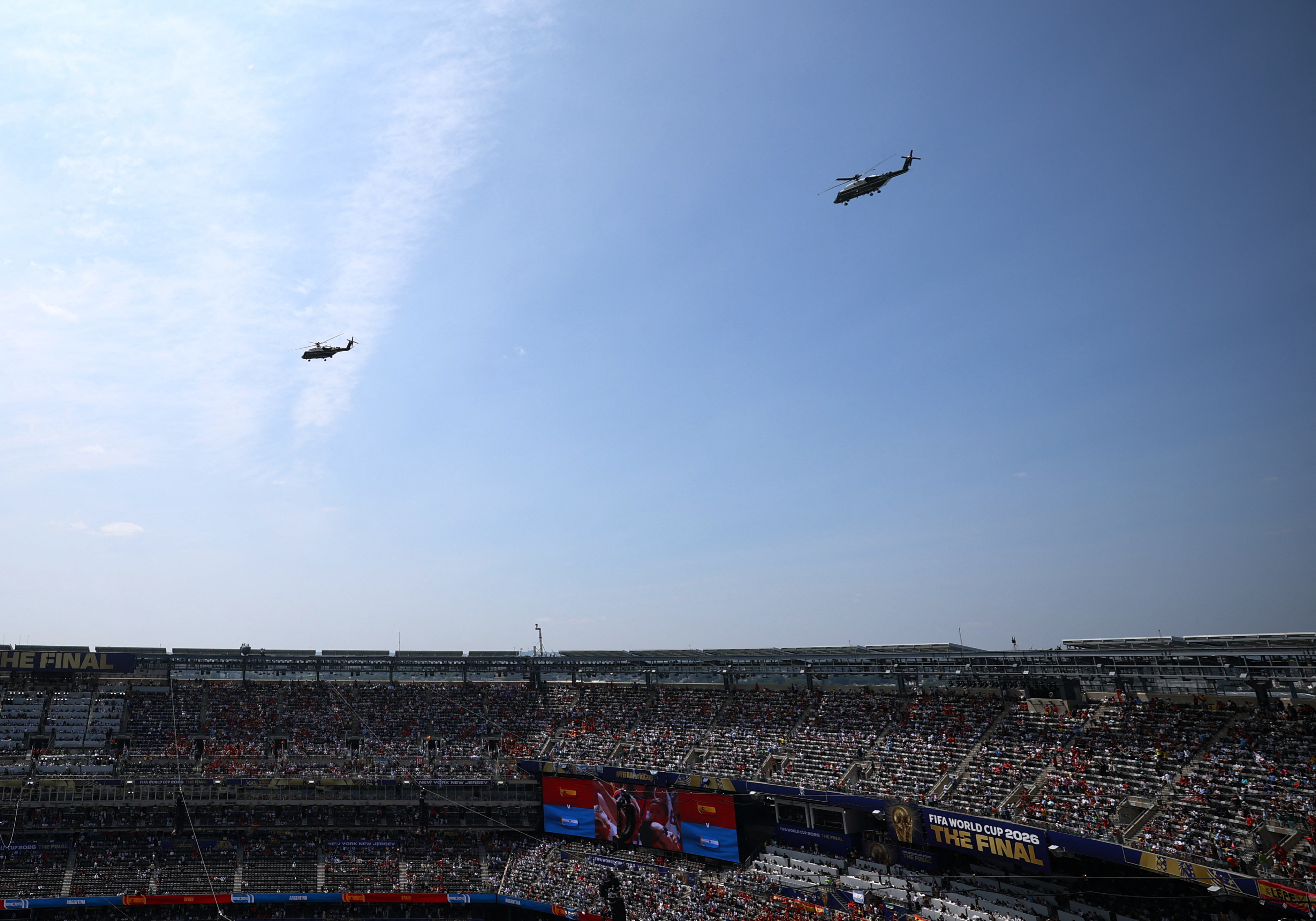 Soccer Football - FIFA World Cup 2026 - Final - Spain v Argentina - New York/New Jersey Stadium, East Rutherford, New Jersey, U.S. - July 19, 2026 General view of Marine One helicopters carrying U.S. President Donald Trump over the stadium before the match REUTERS/Carlos Barria