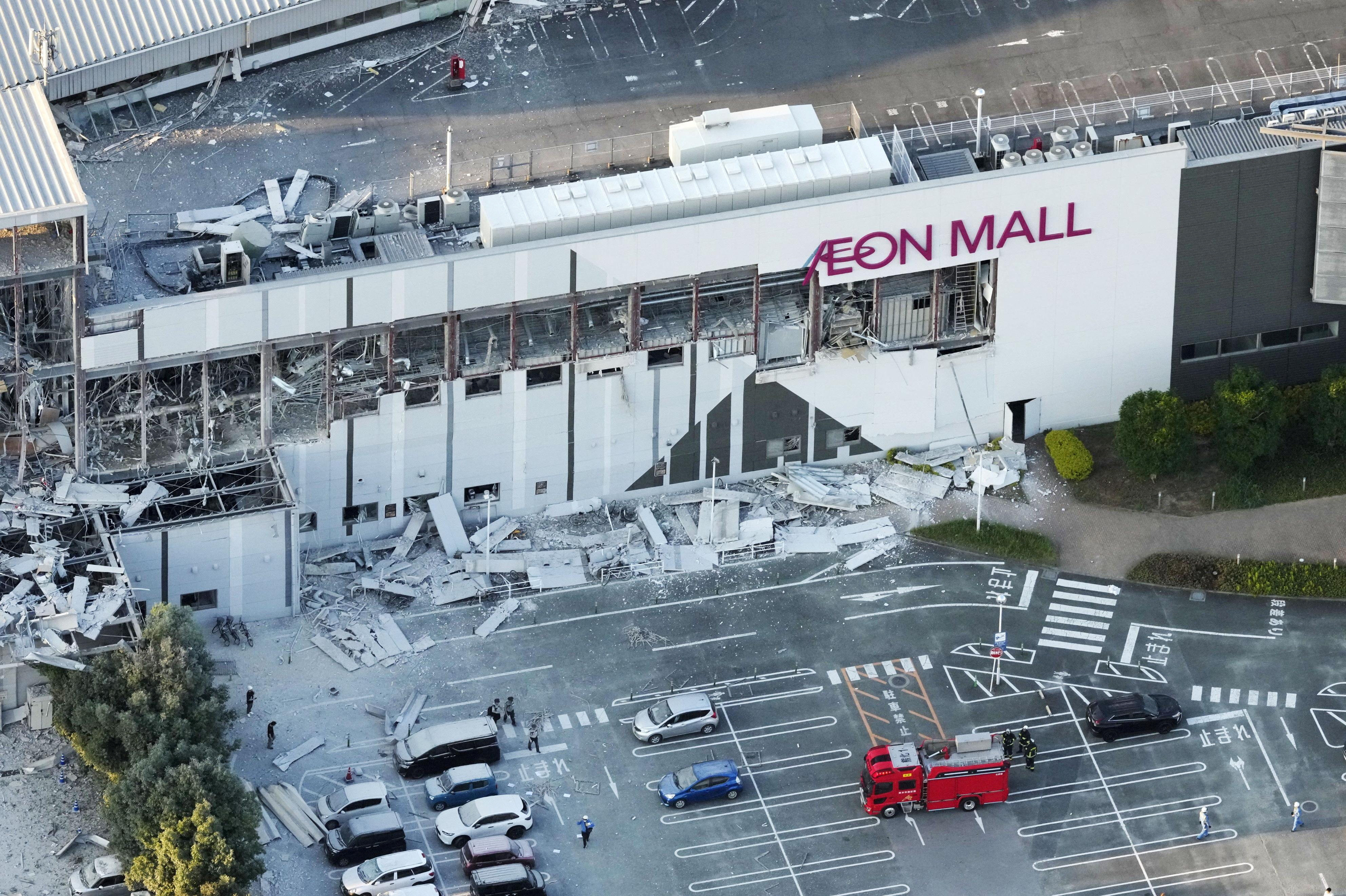 An aerial view shows the damaged Aeon Mall shopping centre