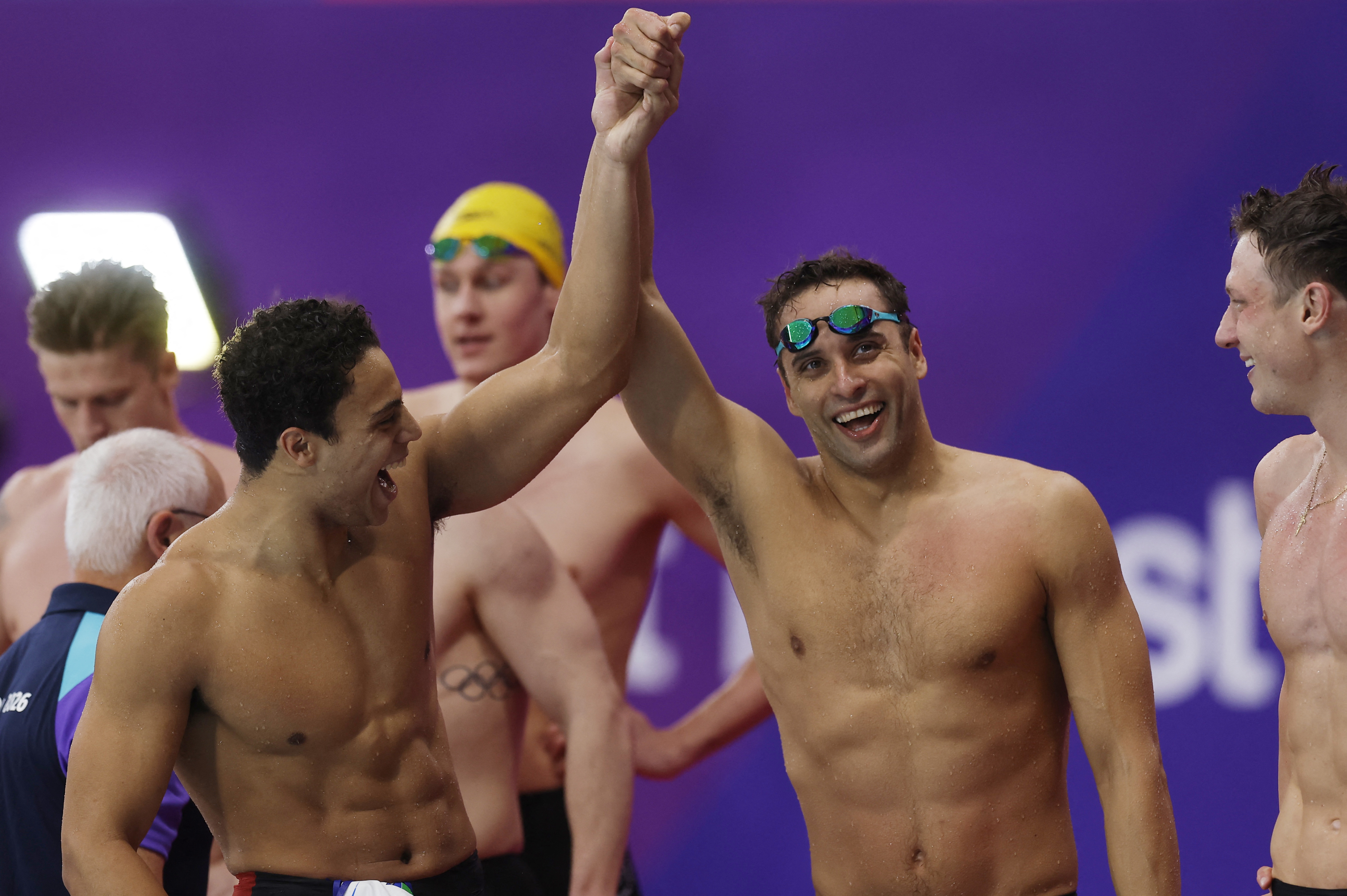 Bronze medallists South Africa's Michael Houlie and Chad le Clos celebrate.