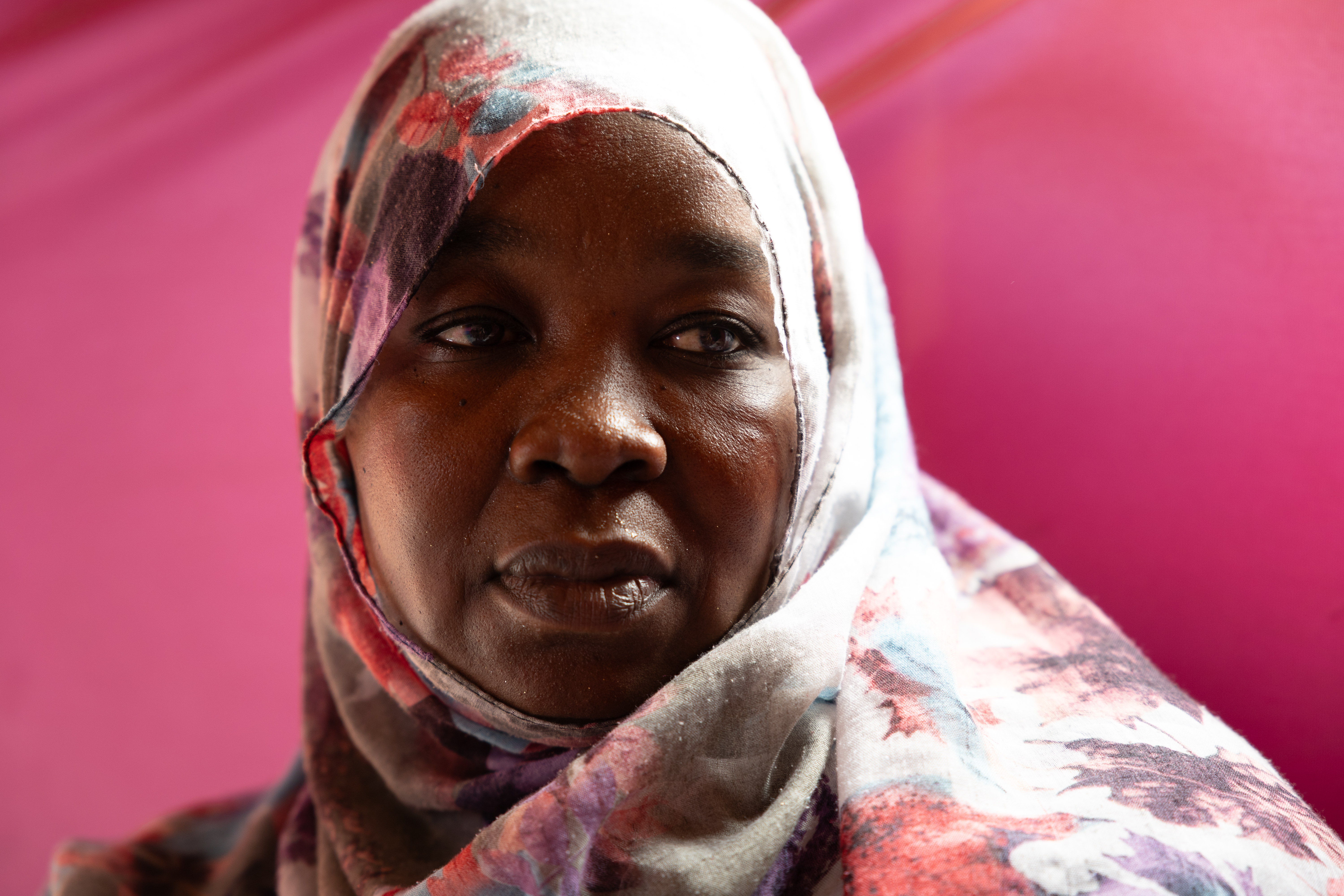 Inside a shelter at the Adre transit site, Zahra Khamis describes how she survived a violent rape and several attacks at her home but lost her child on the road to Adre