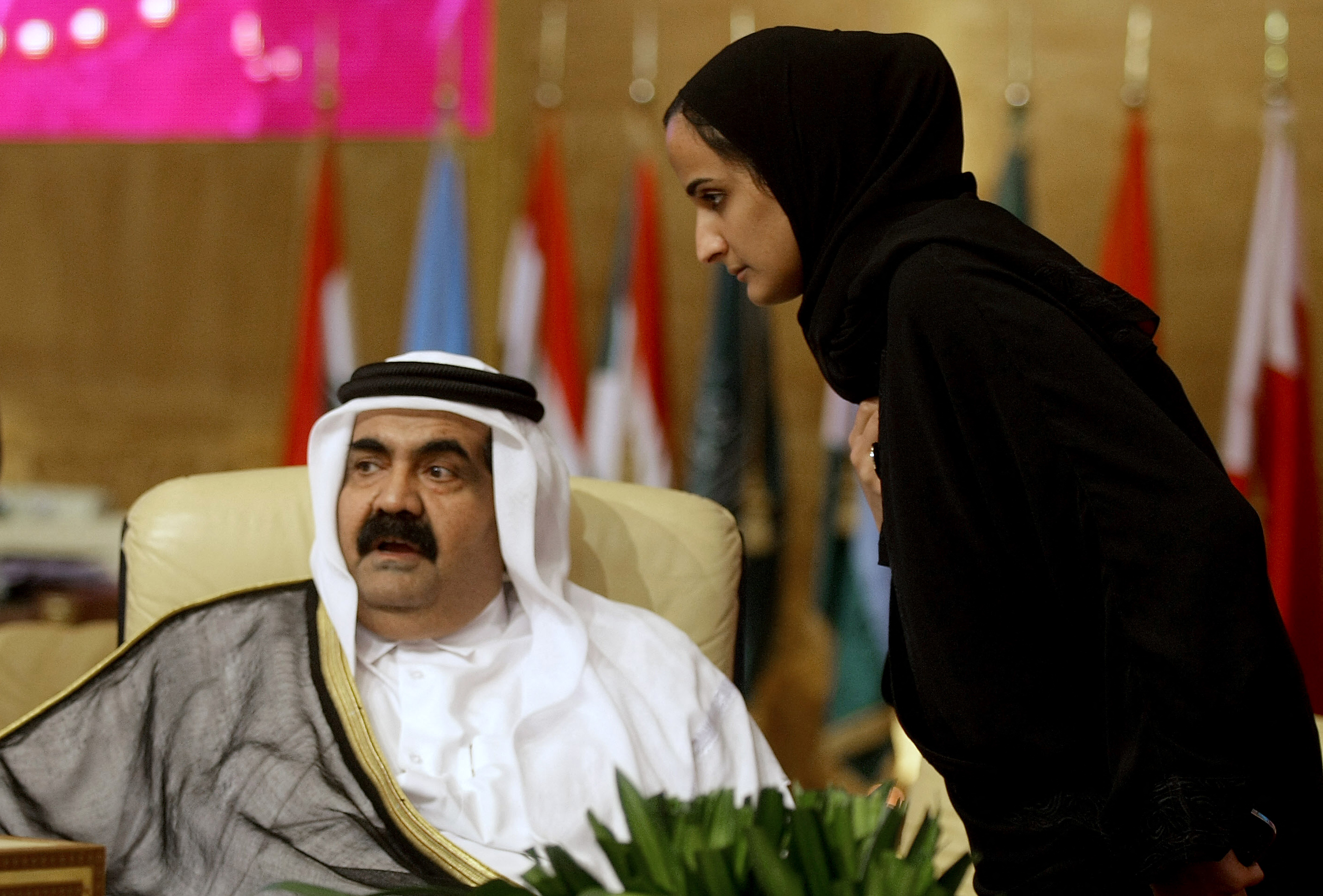 Sheikh Hamad with his daughter Hind at the Arab League summit in Doha