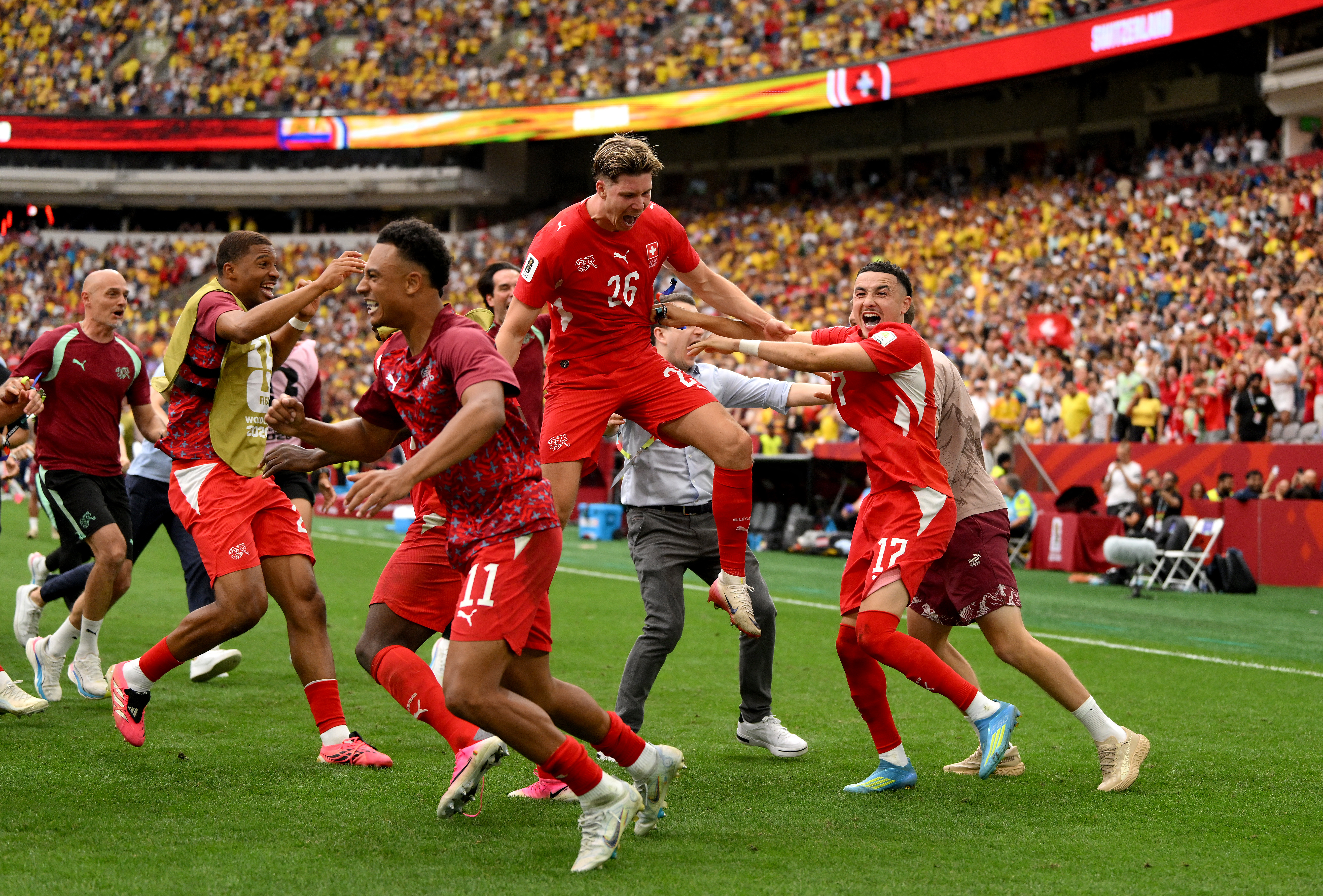 VANCOUVER, CANADA - JULY 07: Ruben Vargas #17 of Switzerland celebrates with teammates after scoring the fifth penalty in a penalty shootout for victory during the FIFA World Cup 2026 Round of 16 match between Switzerland and Colombia at BC Place Vancouver on July 07, 2026 in Vancouver, British Columbia, Canada. David Ramos/Getty Images/AFP (Photo by David Ramos / GETTY IMAGES NORTH AMERICA / Getty Images via AFP)