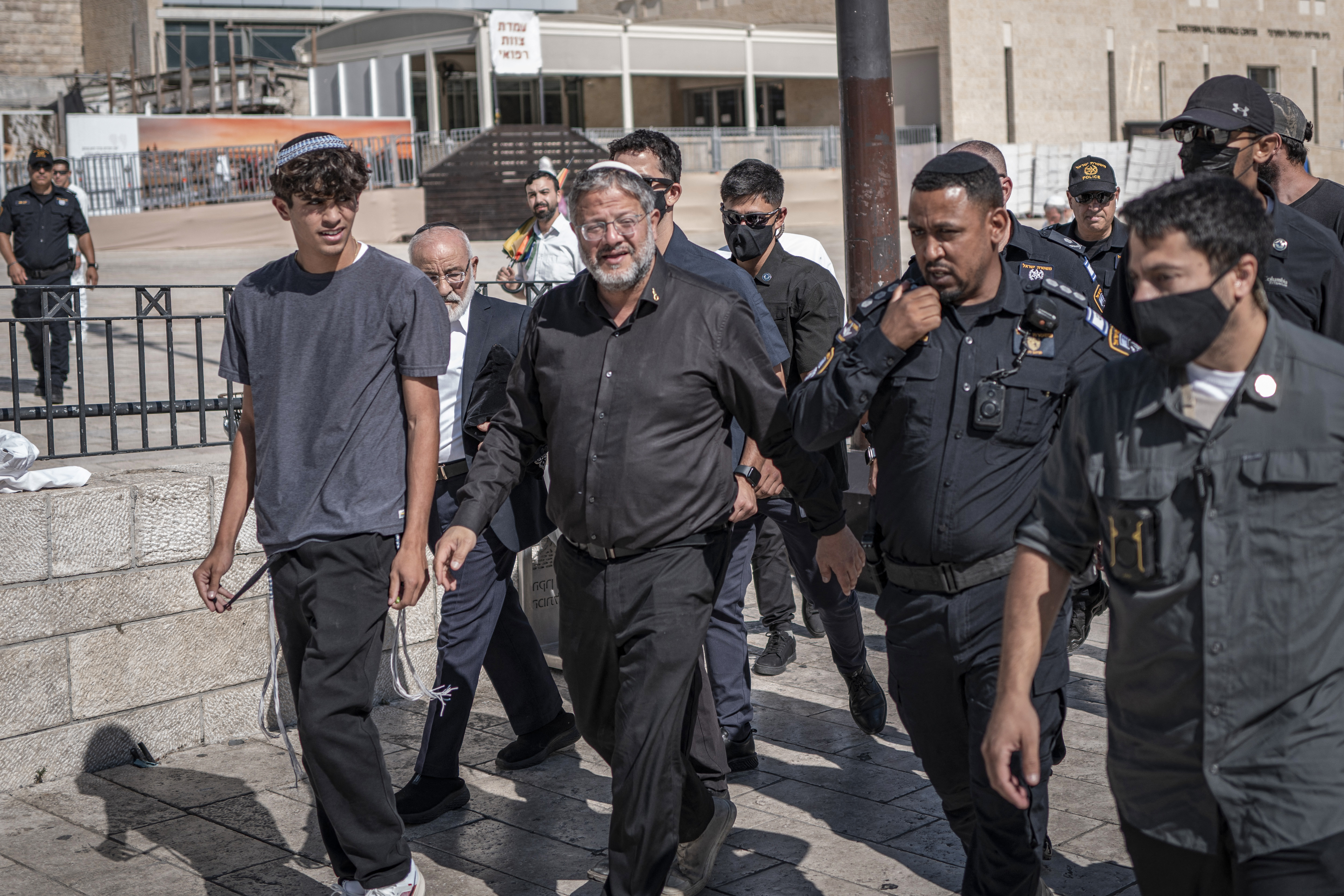 Israel's far-right National Security Minister Itamar Ben Gvir (C) enters Al-Aqsa Mosque compound