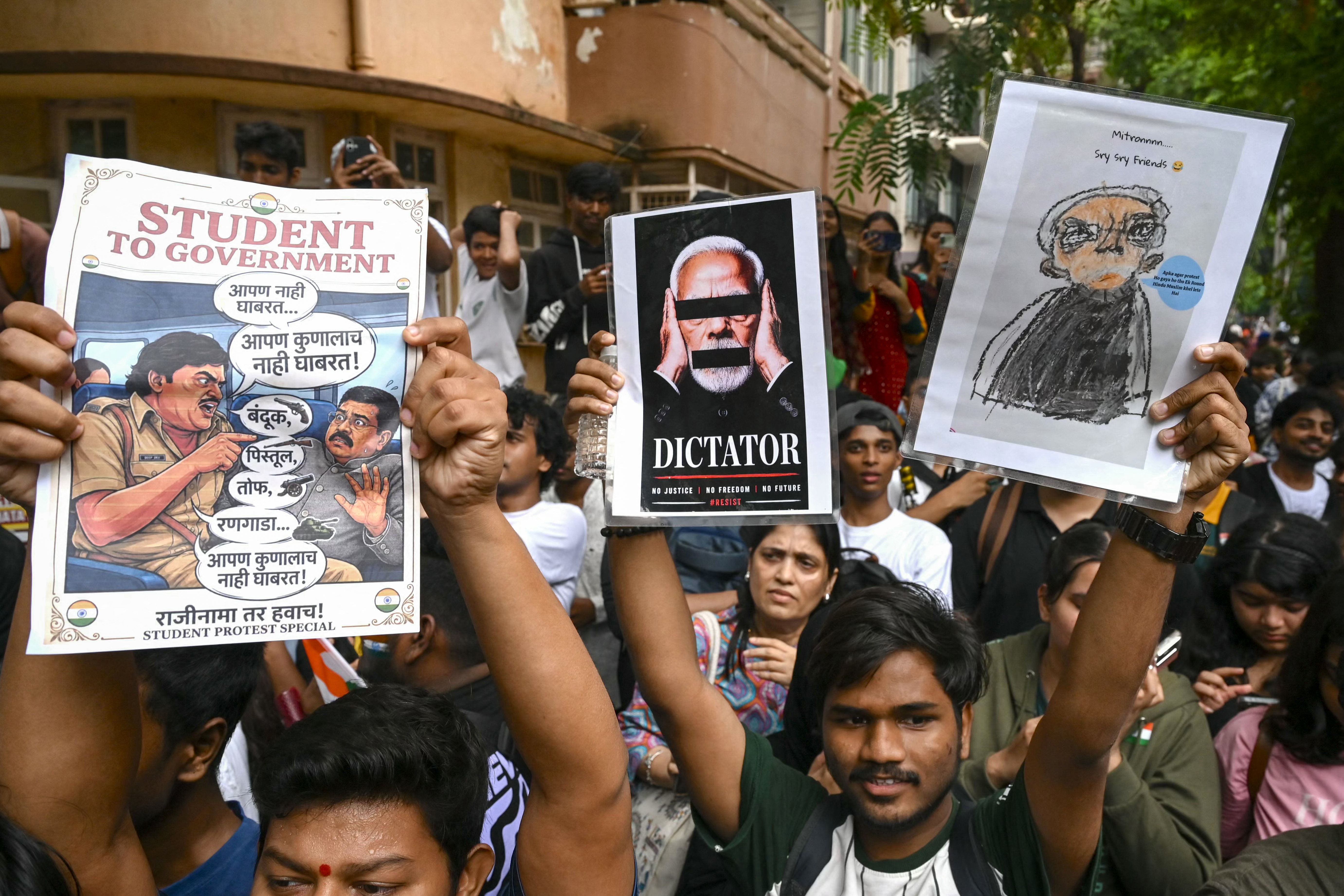 Demonstrators holding posters take part in a protest rally in Mumbai in solidarity with the ongoing protest by the Cockroach Janta Party (CJP) in New Delhi, India on July 24, 2026.