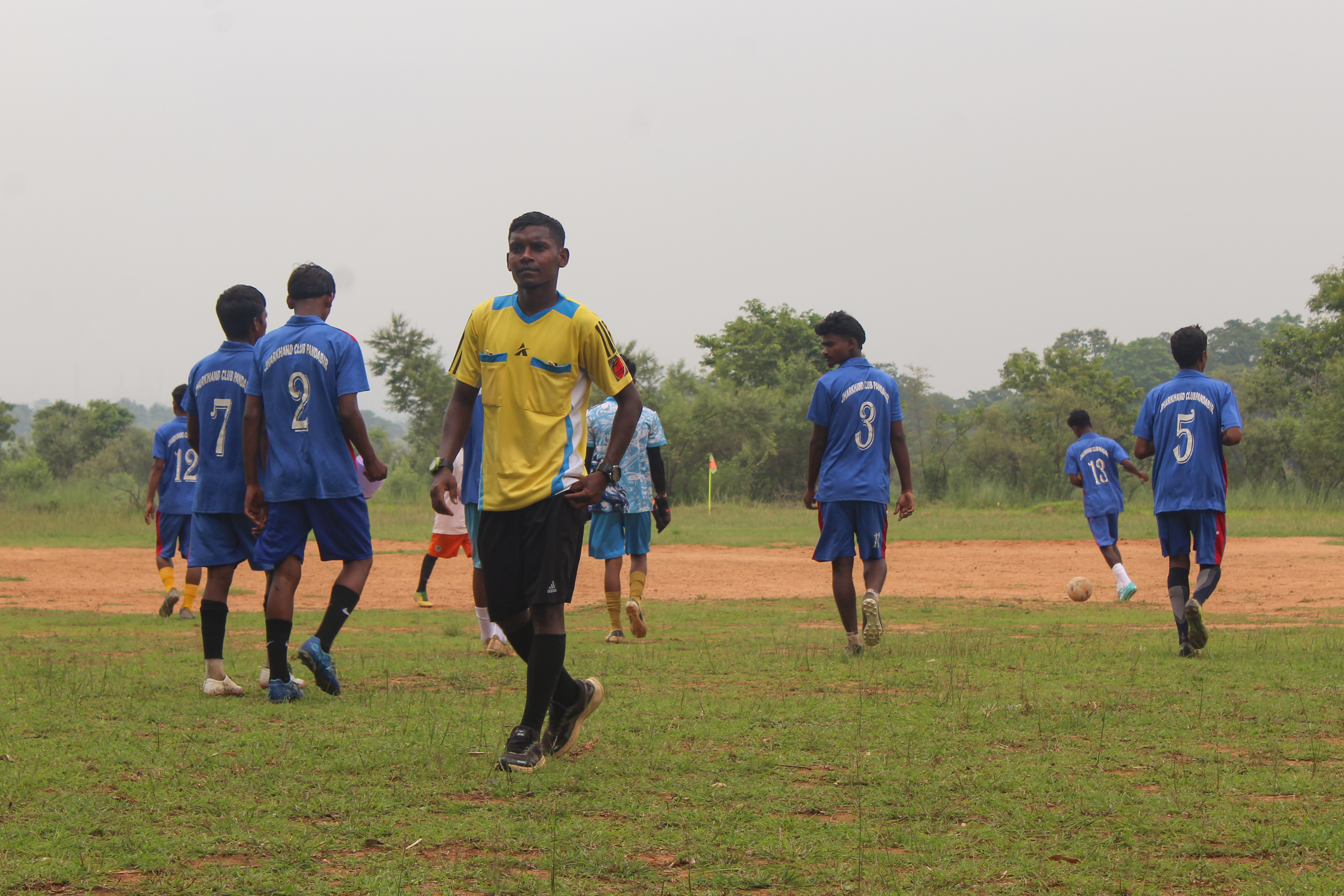 A football match in progress at the tournament in Chaibasa