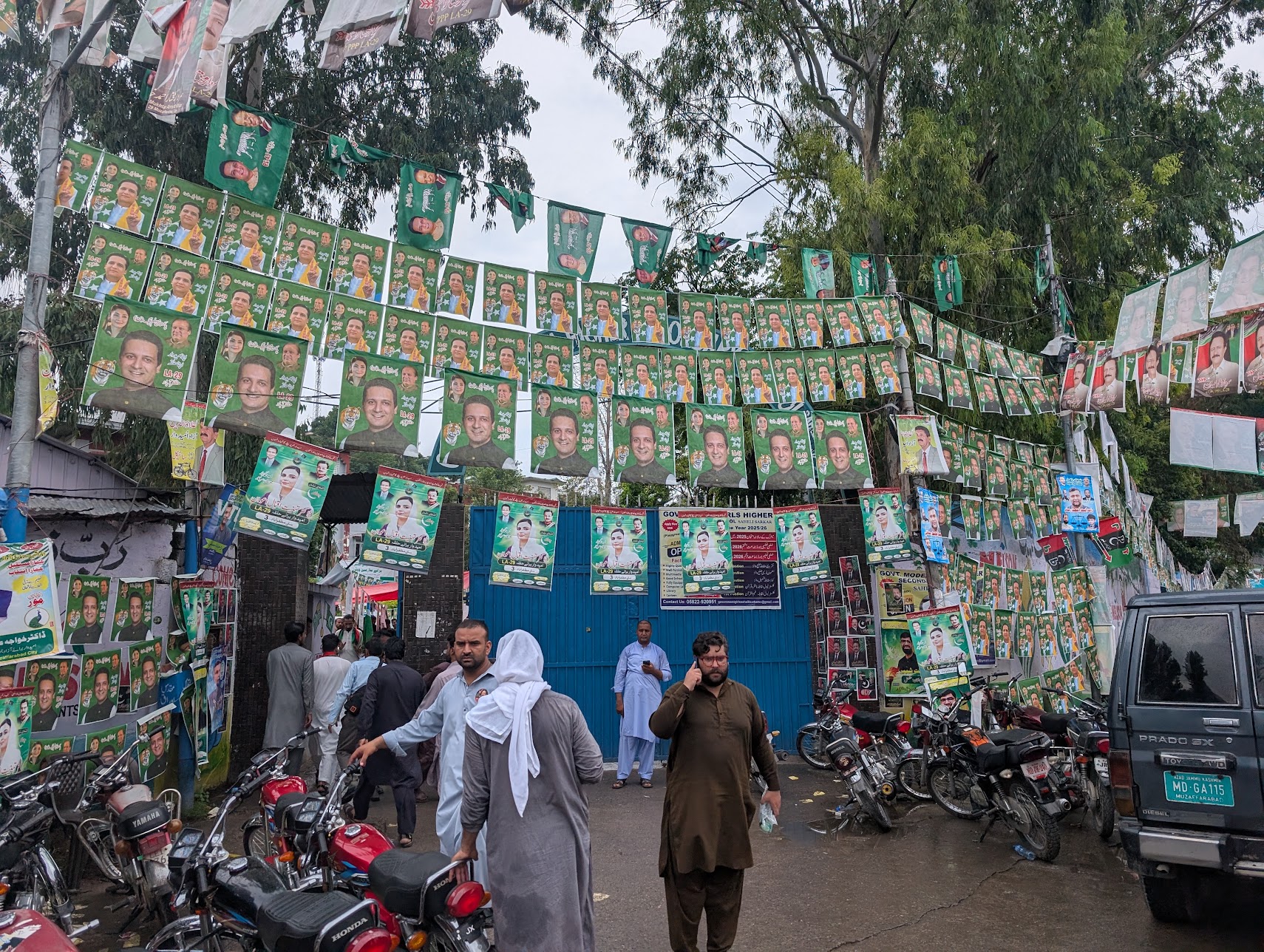 Government officers leave a polling station on Monday after early polls for government officials began