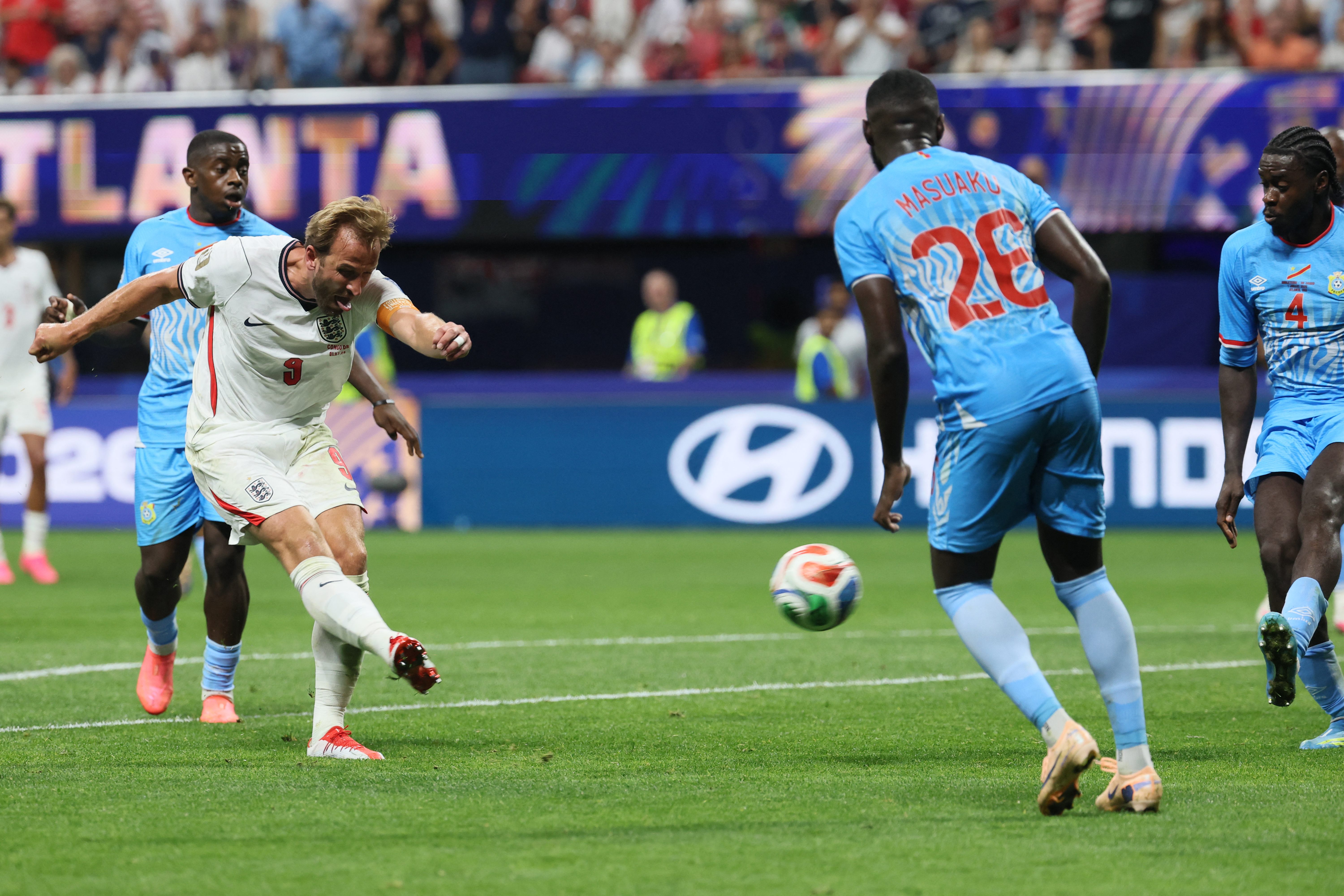 England's forward #09 Harry Kane shoots and scores his team's second goal during the 2026 World Cup round of 32 match football between England and the Democratic Republic of Congo at the Atlanta Stadium in Atlanta on July 1, 2026.