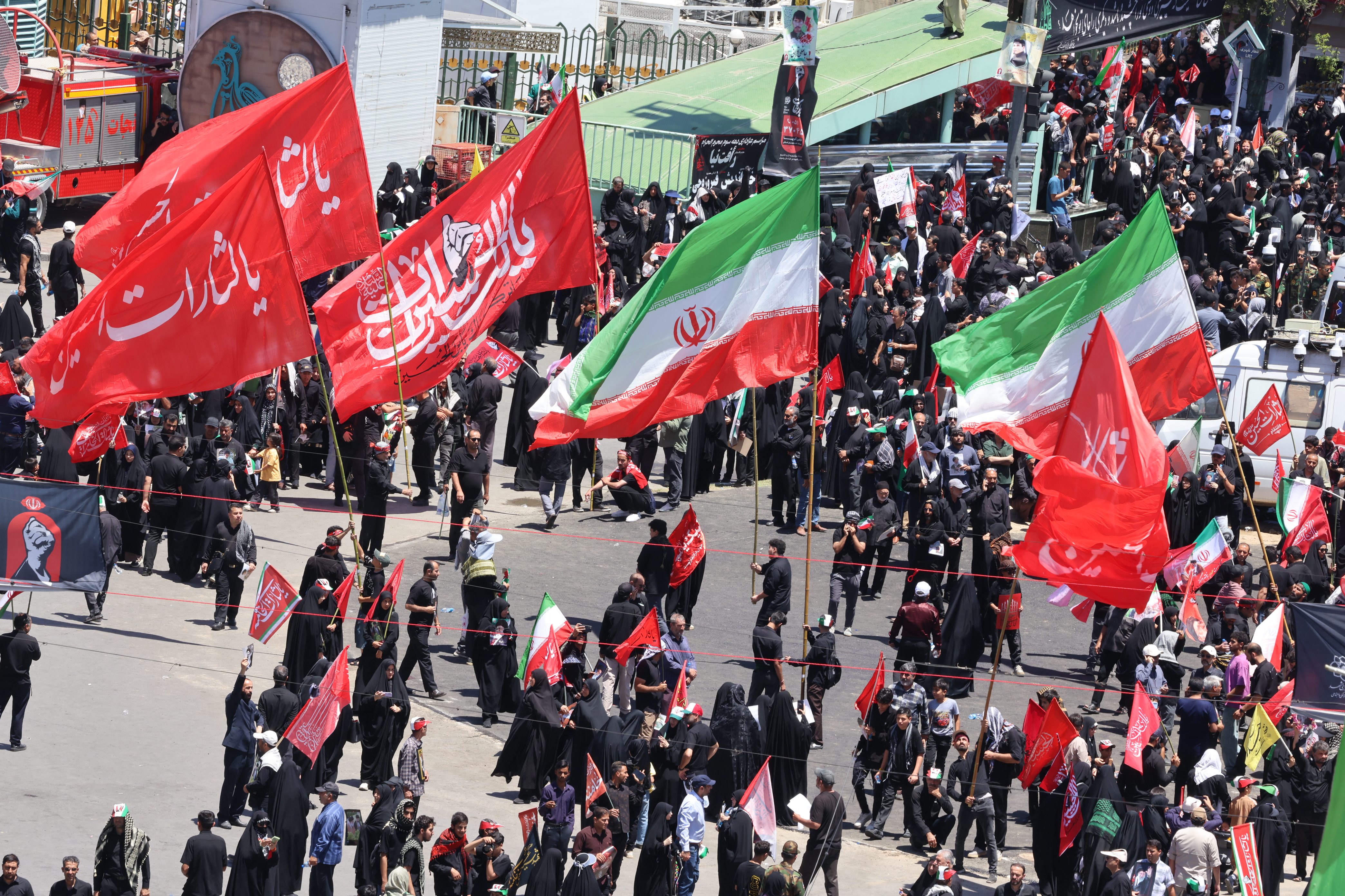 Mourners gather in the street before the funeral of Iran’s slain Supreme Leader Ali Khamenei and members of his family at the Shrine of Imam Reza, Iran’s most revered place of worship, in Mashhad on July 9, 2026 [AFP]