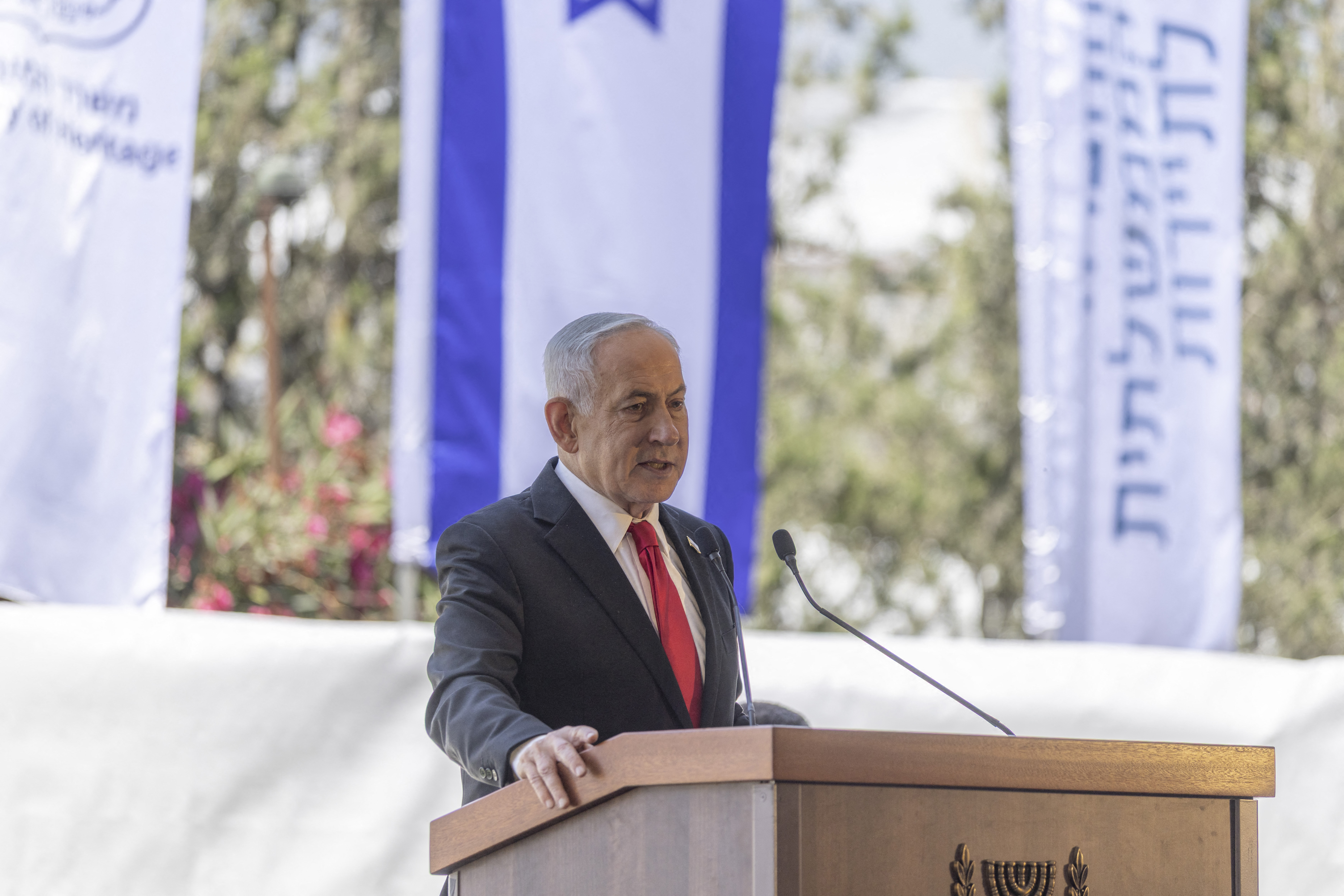 Israel's Prime Minister Benjamin Netanyahu speaks during a cornerstone laying ceremony for the Atarot Heritage Center at an abandon airport in occupied East Jerusalem