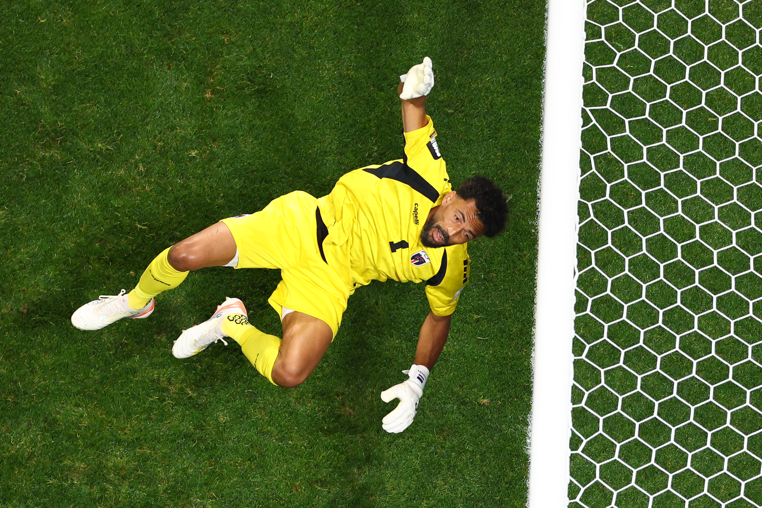Cape Verde goalkeeper Vozinha saves a ball during the World Cup Group H soccer match against Spain in Atlanta, Monday, June 15, 2026. (AP Photo/Colin Hubbard)