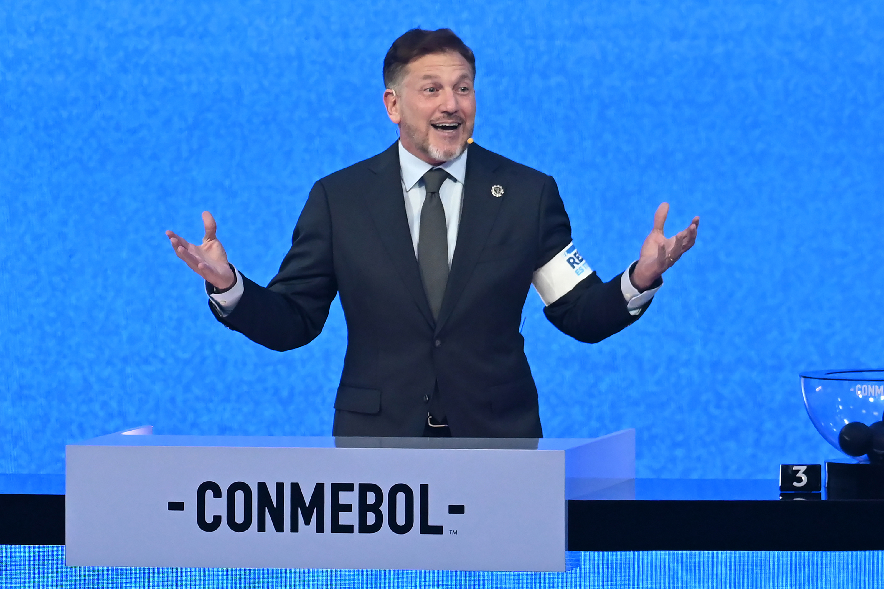 President of CONMEBOL Alejandro Dominguez speaks on stage ahead the Copa CONMEBOL Libertadores 2026 draw on March 19, 2026 in Luque, Paraguay. (Photo by Christian Alvarenga/Getty Images)